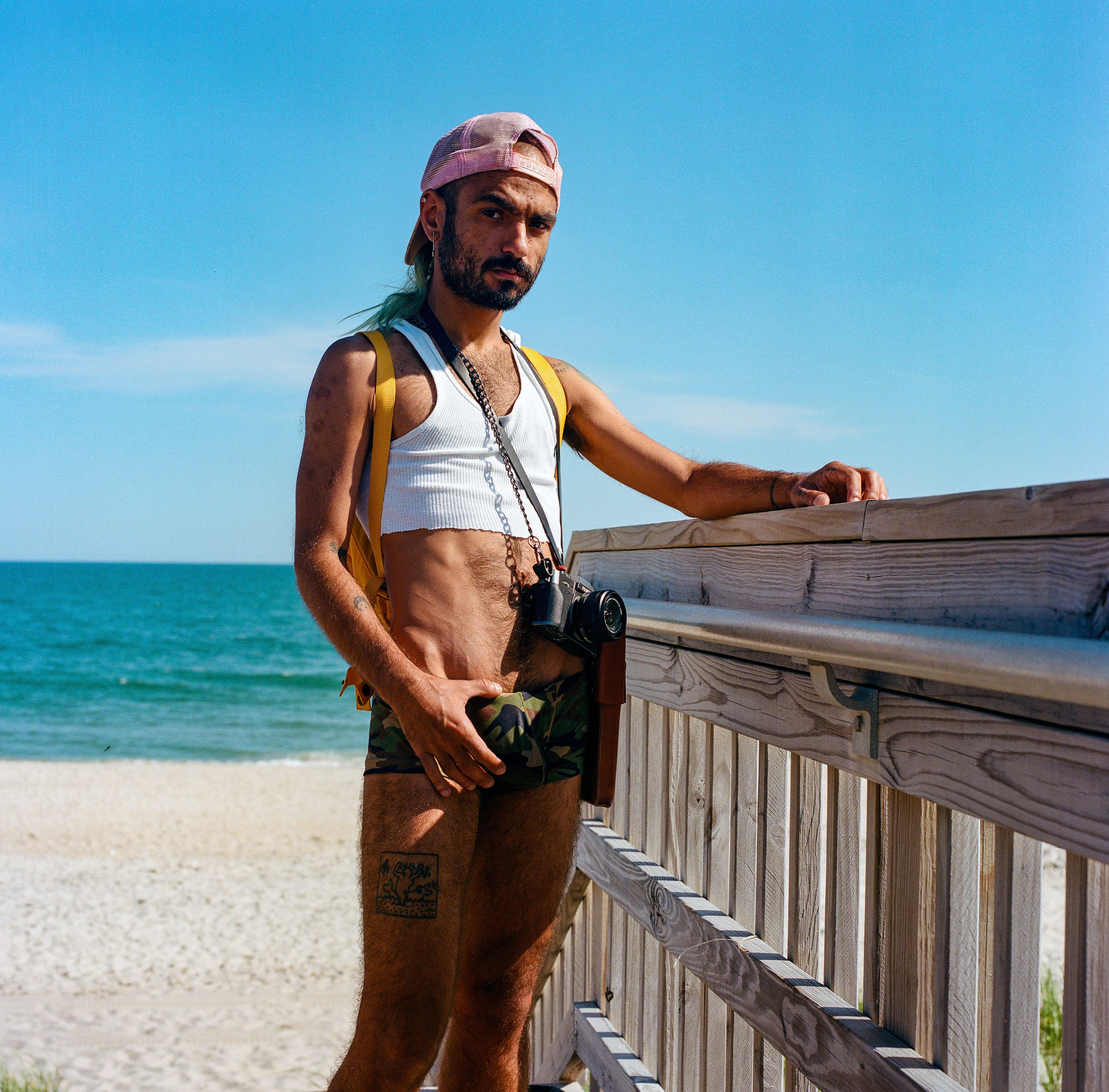 Fire Island 007, a square-format photograph street photograph made in Fire Island Pines, New York by Robert Andy Coombs.
