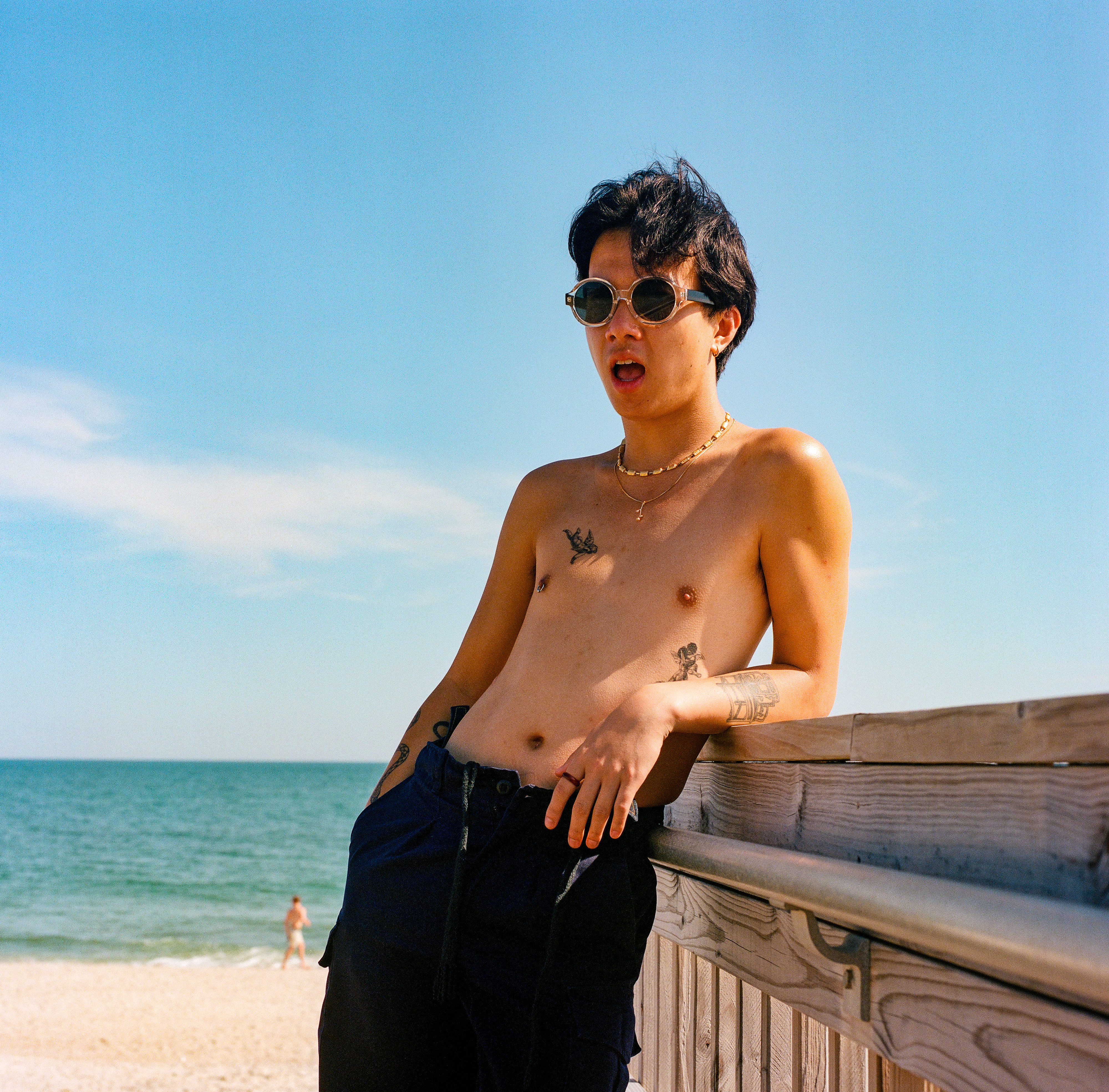 Fire Island 009, a square-format photograph street photograph made in Fire Island Pines, New York by Robert Andy Coombs.
