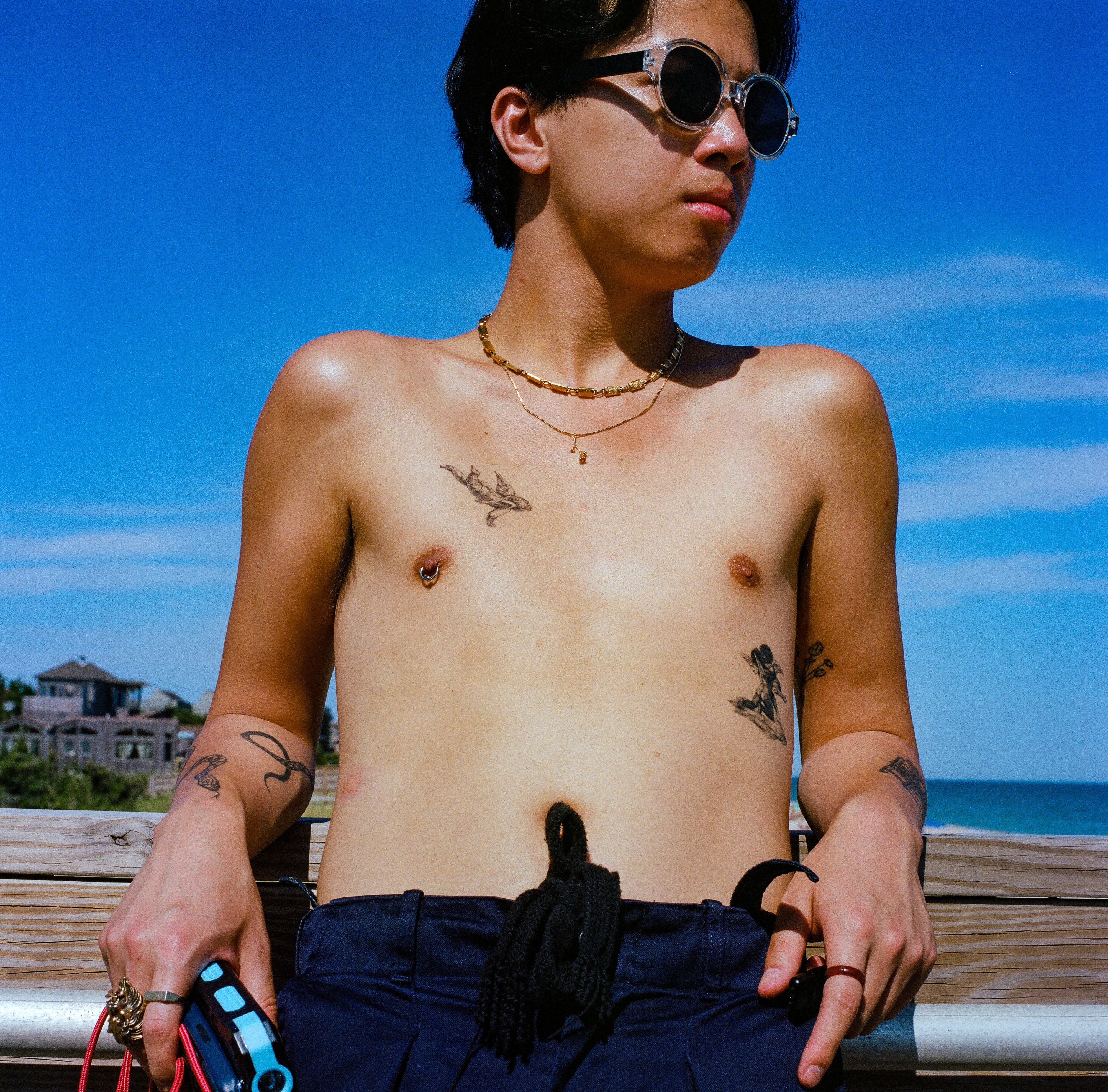 Fire Island 010, a square-format photograph street photograph made in Fire Island Pines, New York by Robert Andy Coombs.