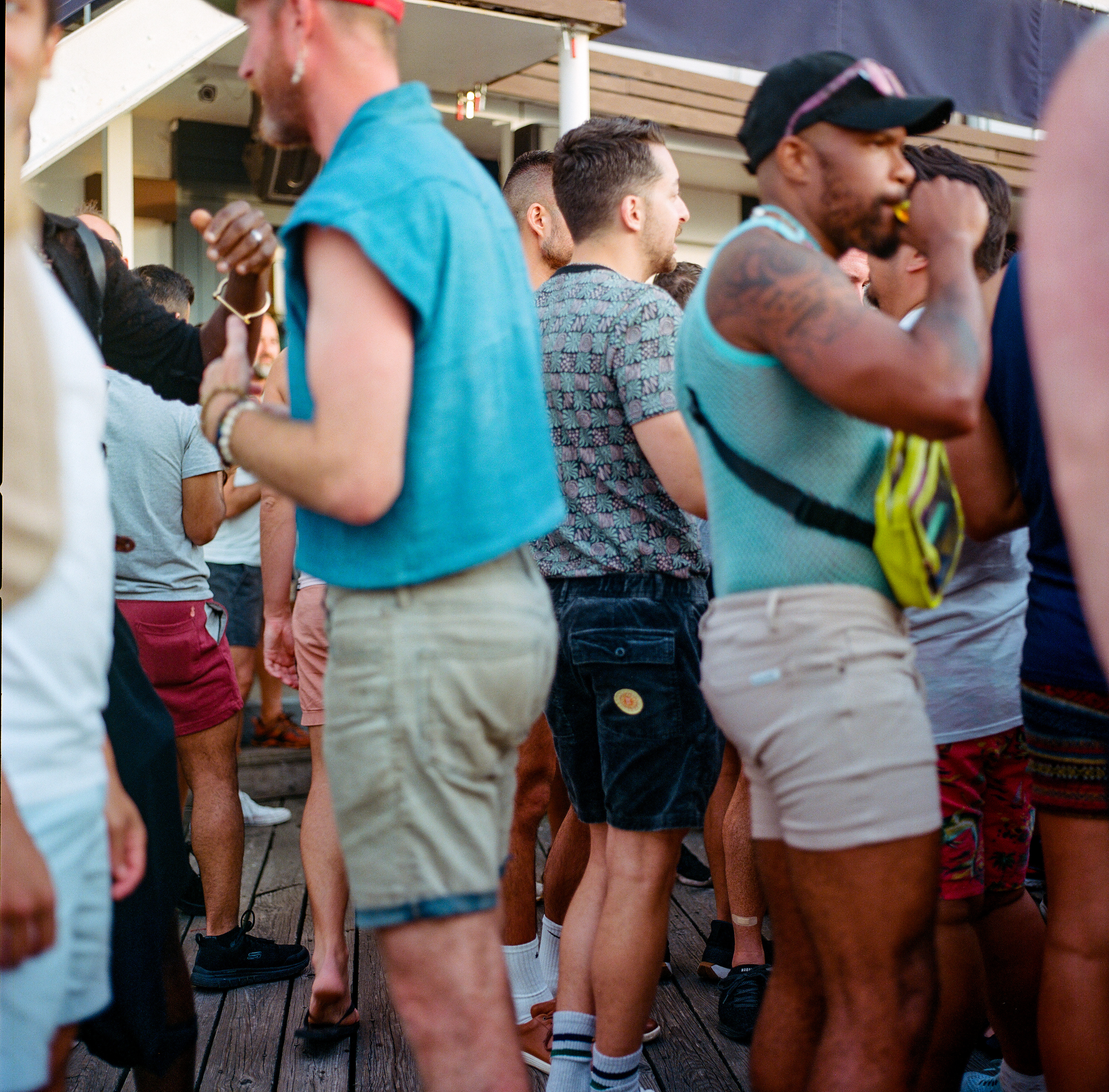 Fire Island 021, a square-format photograph street photograph made in Fire Island Pines, New York by Robert Andy Coombs.