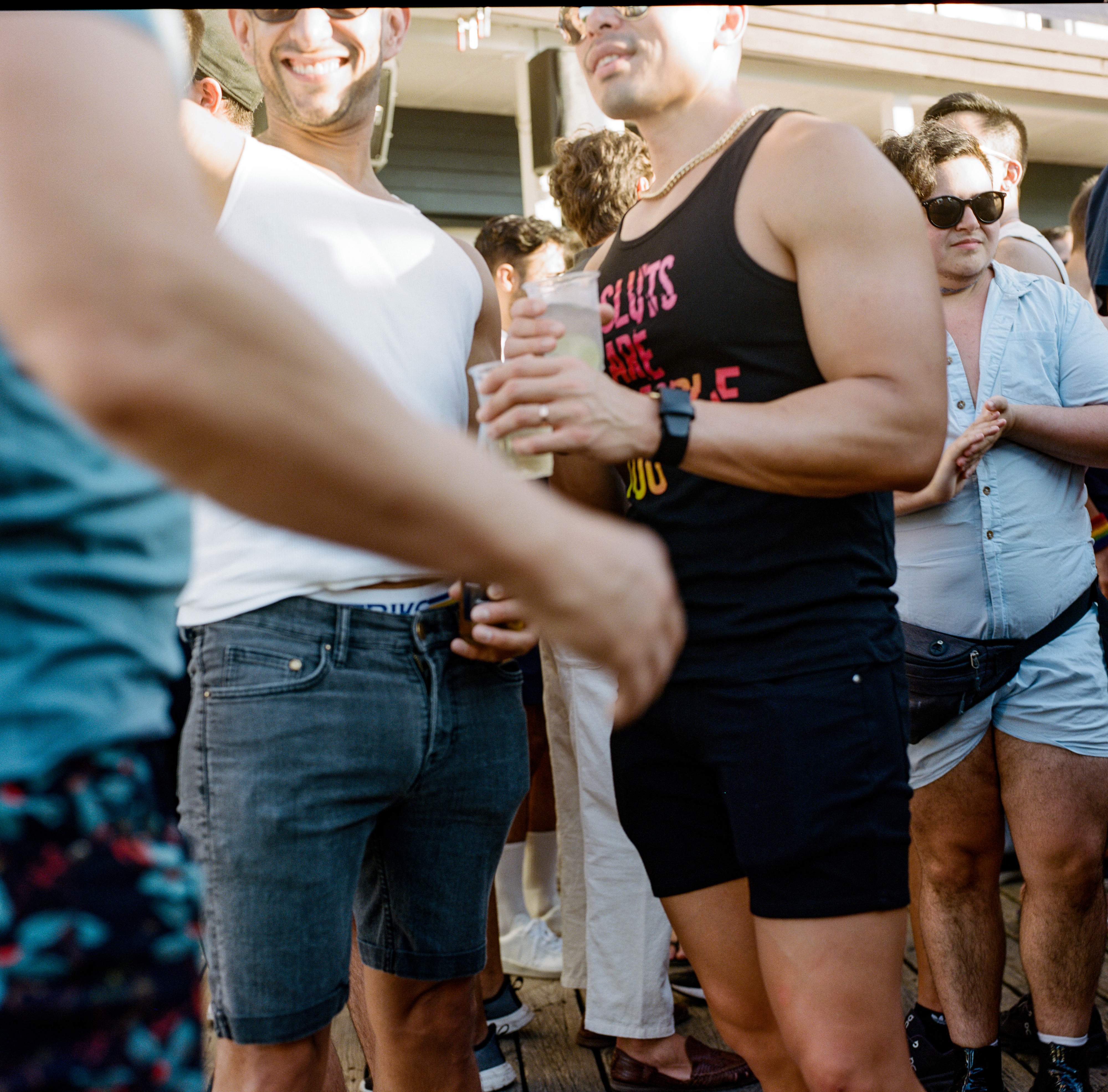 Fire Island 031, a square-format photograph street photograph made in Fire Island Pines, New York by Robert Andy Coombs.