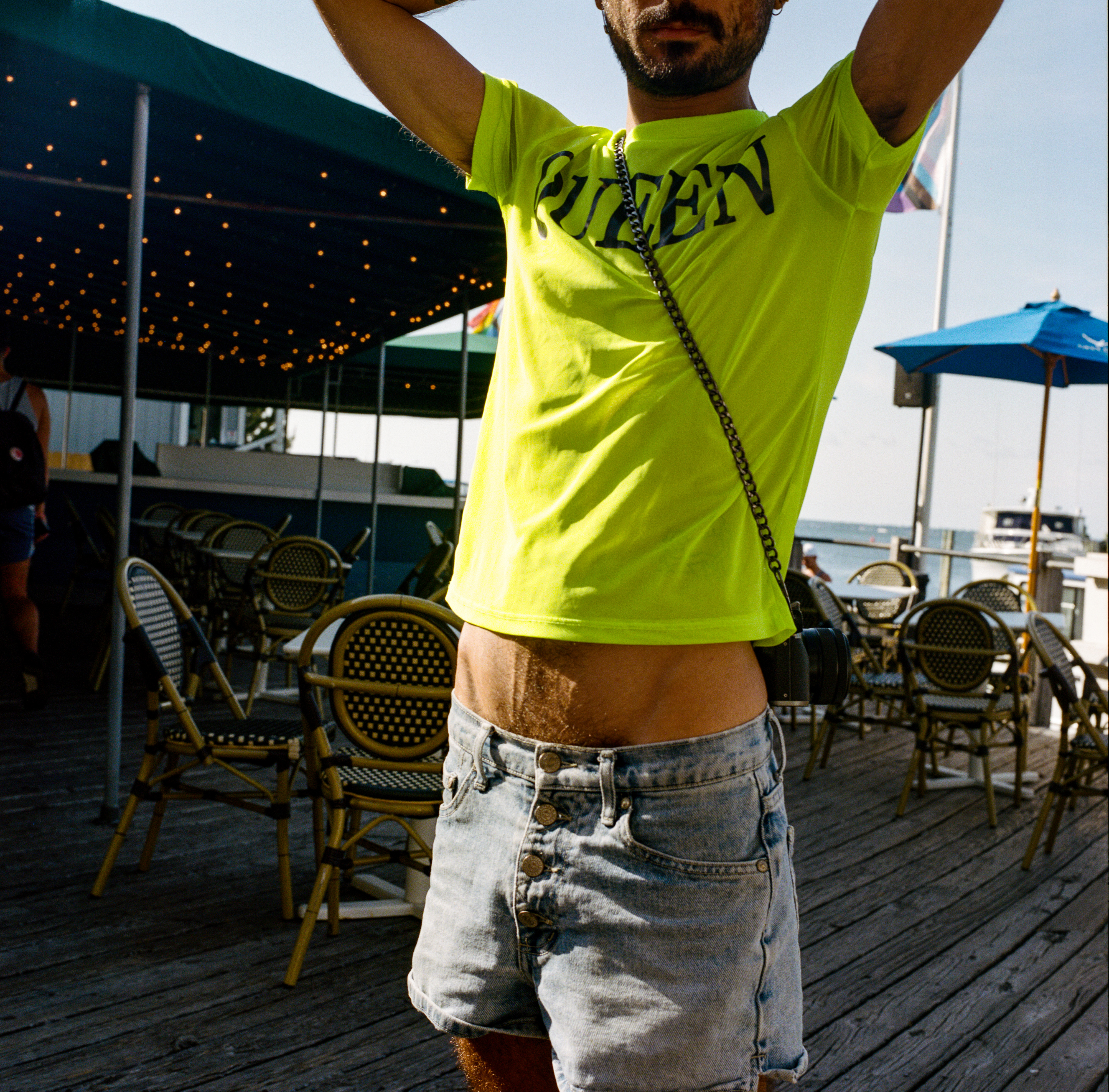 Fire Island 036, a square-format photograph street photograph made in Fire Island Pines, New York by Robert Andy Coombs.