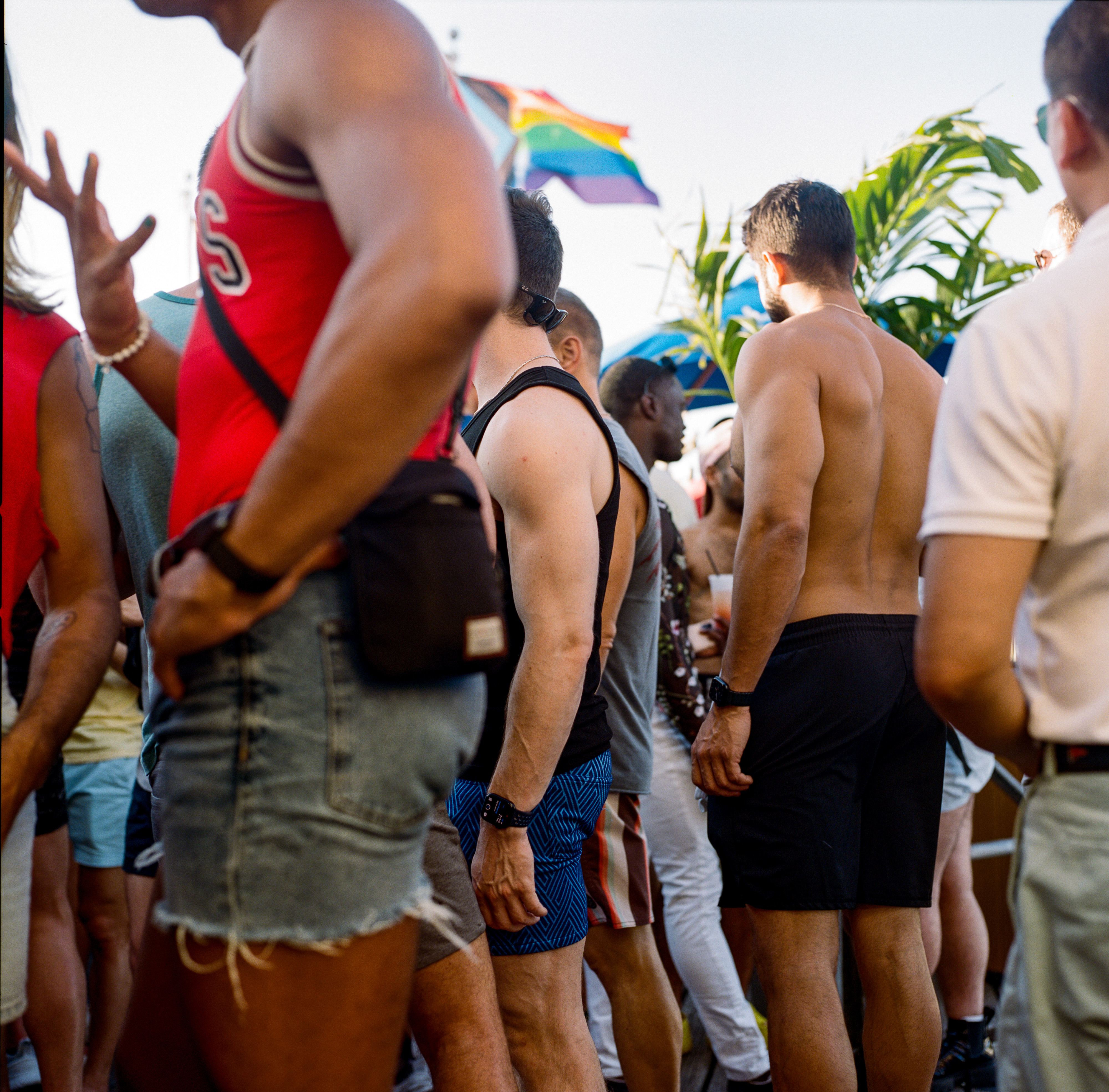 Fire Island 043, a square-format photograph street photograph made in Fire Island Pines, New York by Robert Andy Coombs.