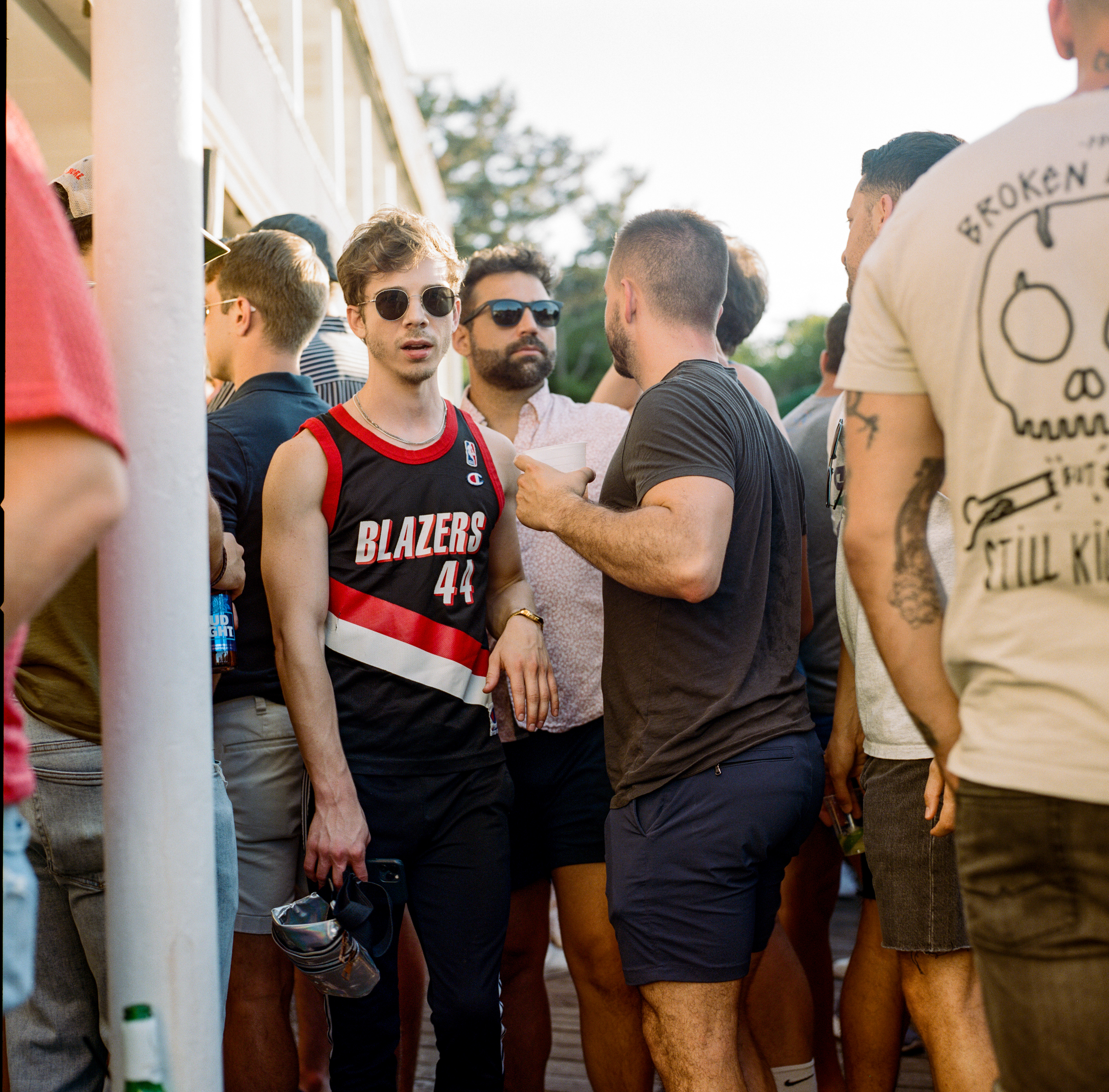 Fire Island 044, a square-format photograph street photograph made in Fire Island Pines, New York by Robert Andy Coombs.