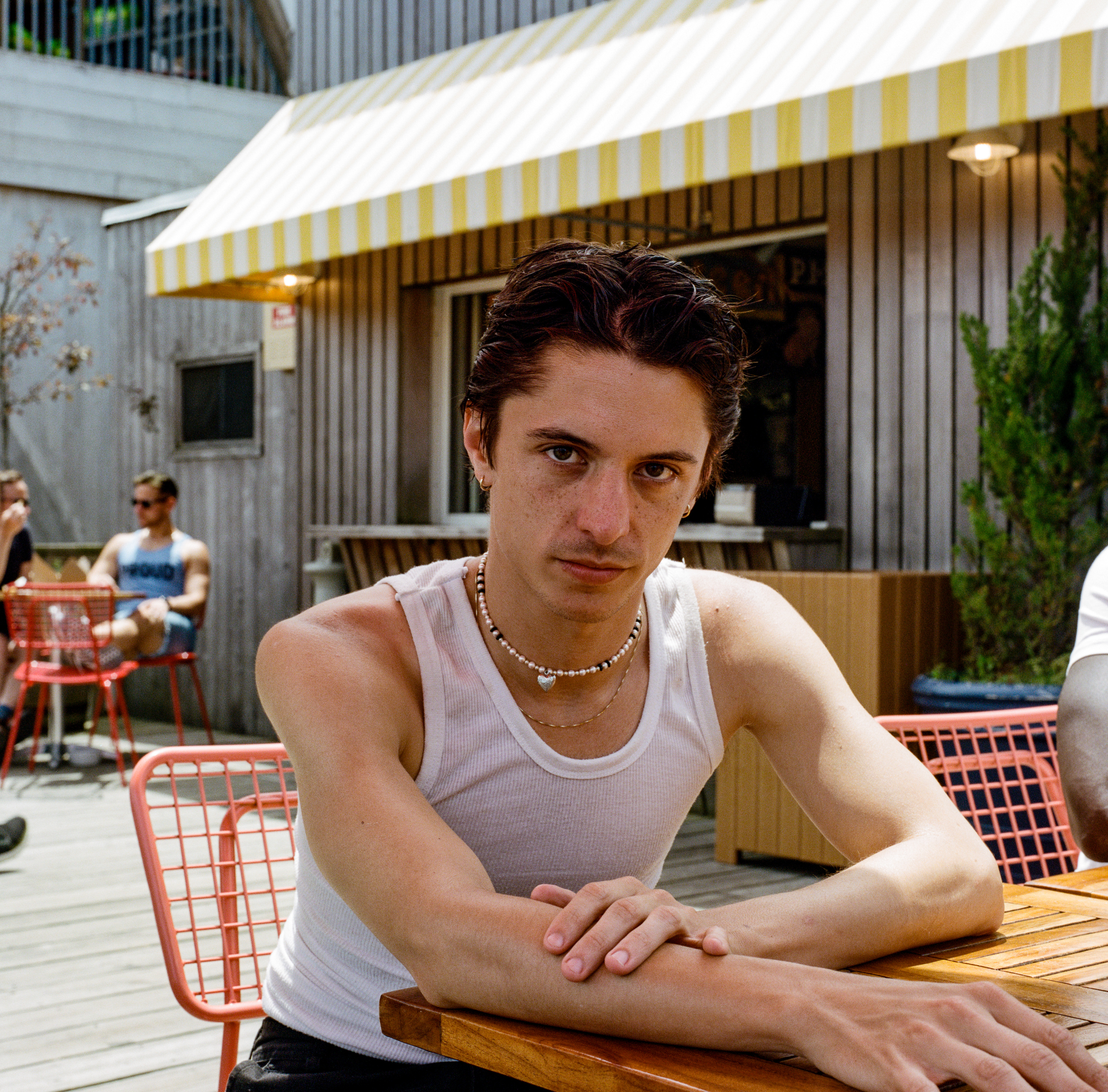 Fire Island 065, a square-format photograph street photograph made in Fire Island Pines, New York by Robert Andy Coombs.