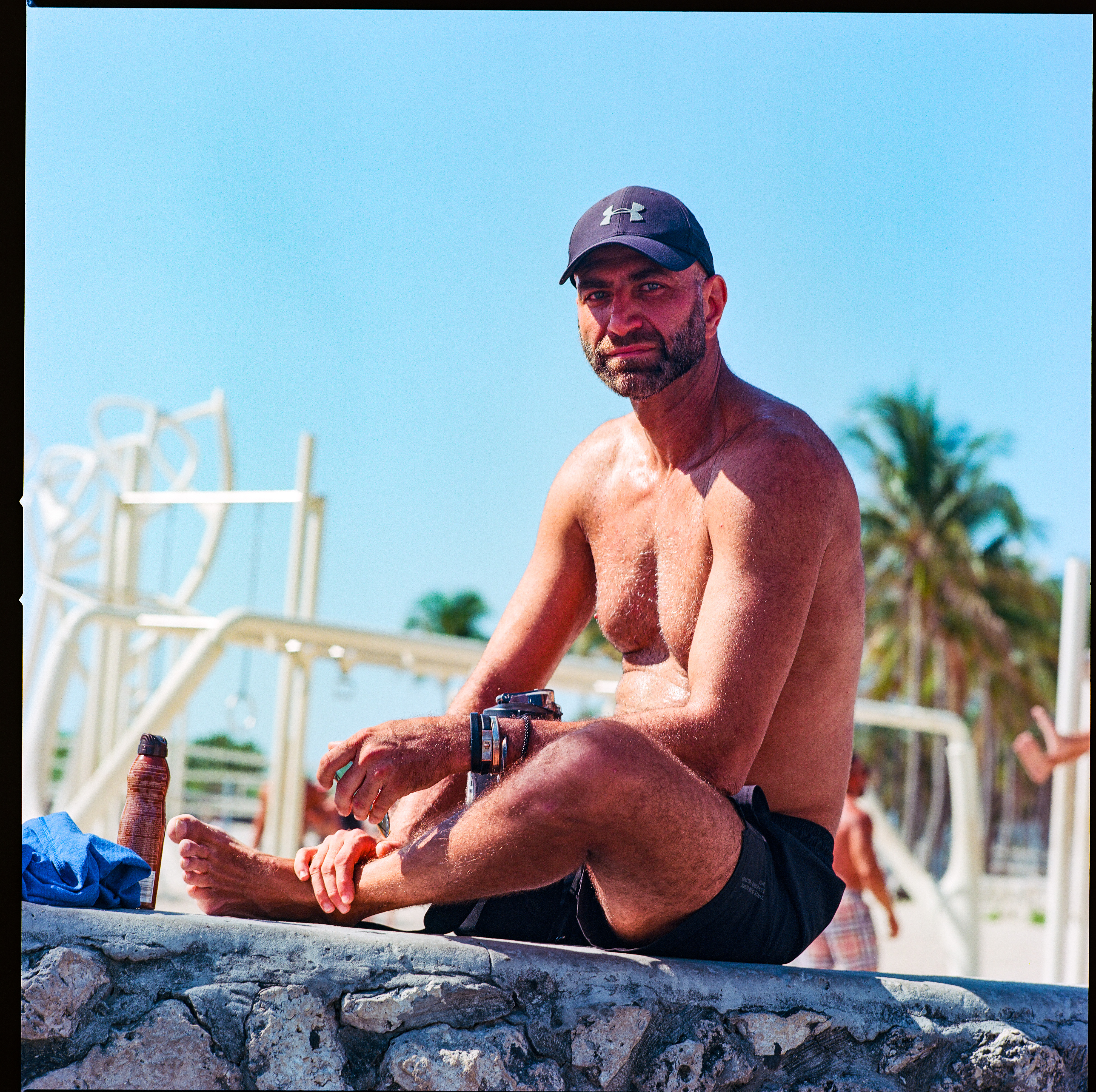 Miami Beach 012, a square-format photograph street photograph made in Miami Beach, Florida by Robert Andy Coombs.
