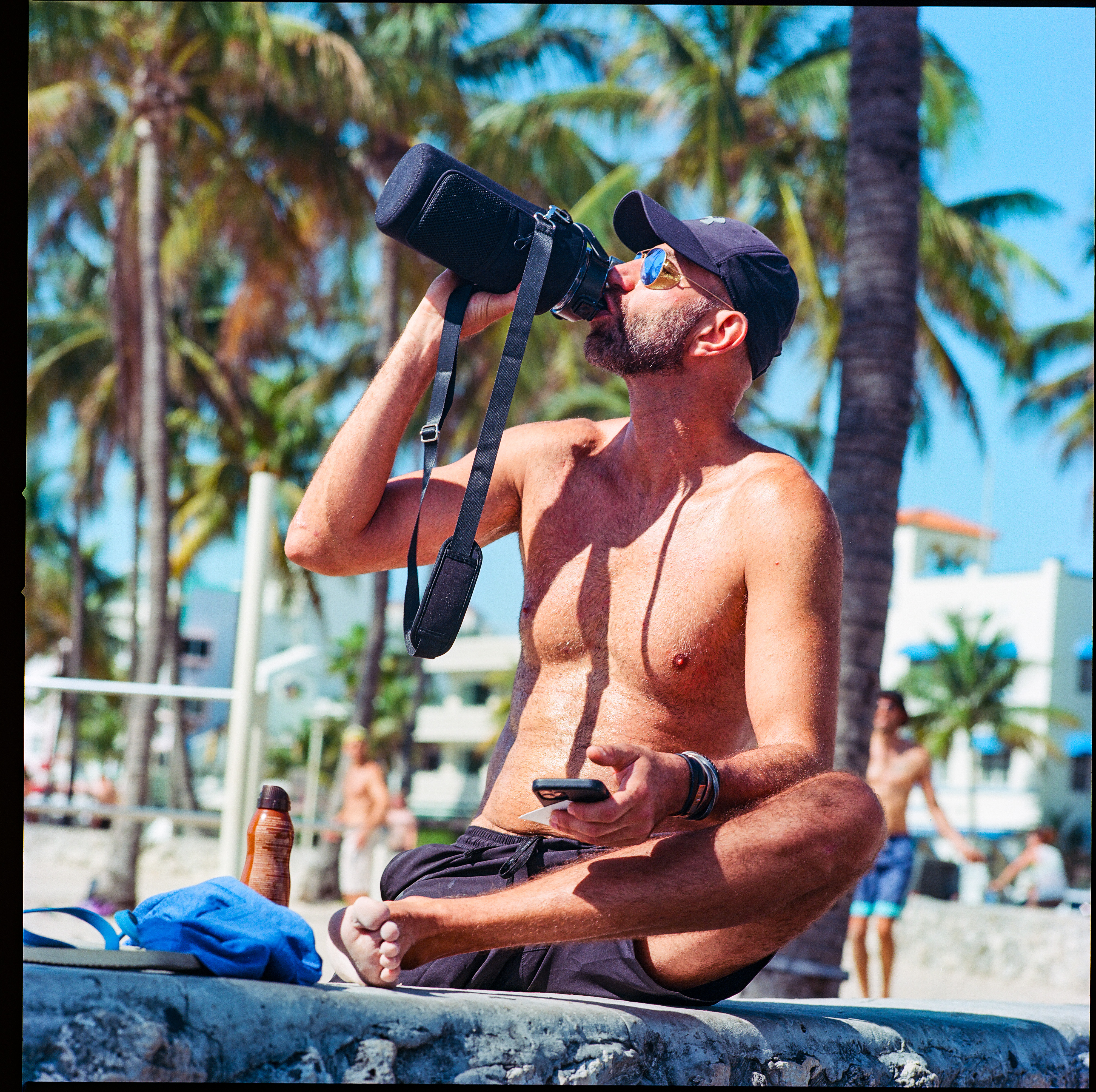 Miami Beach 013, a square-format photograph street photograph made in Miami Beach, Florida by Robert Andy Coombs.