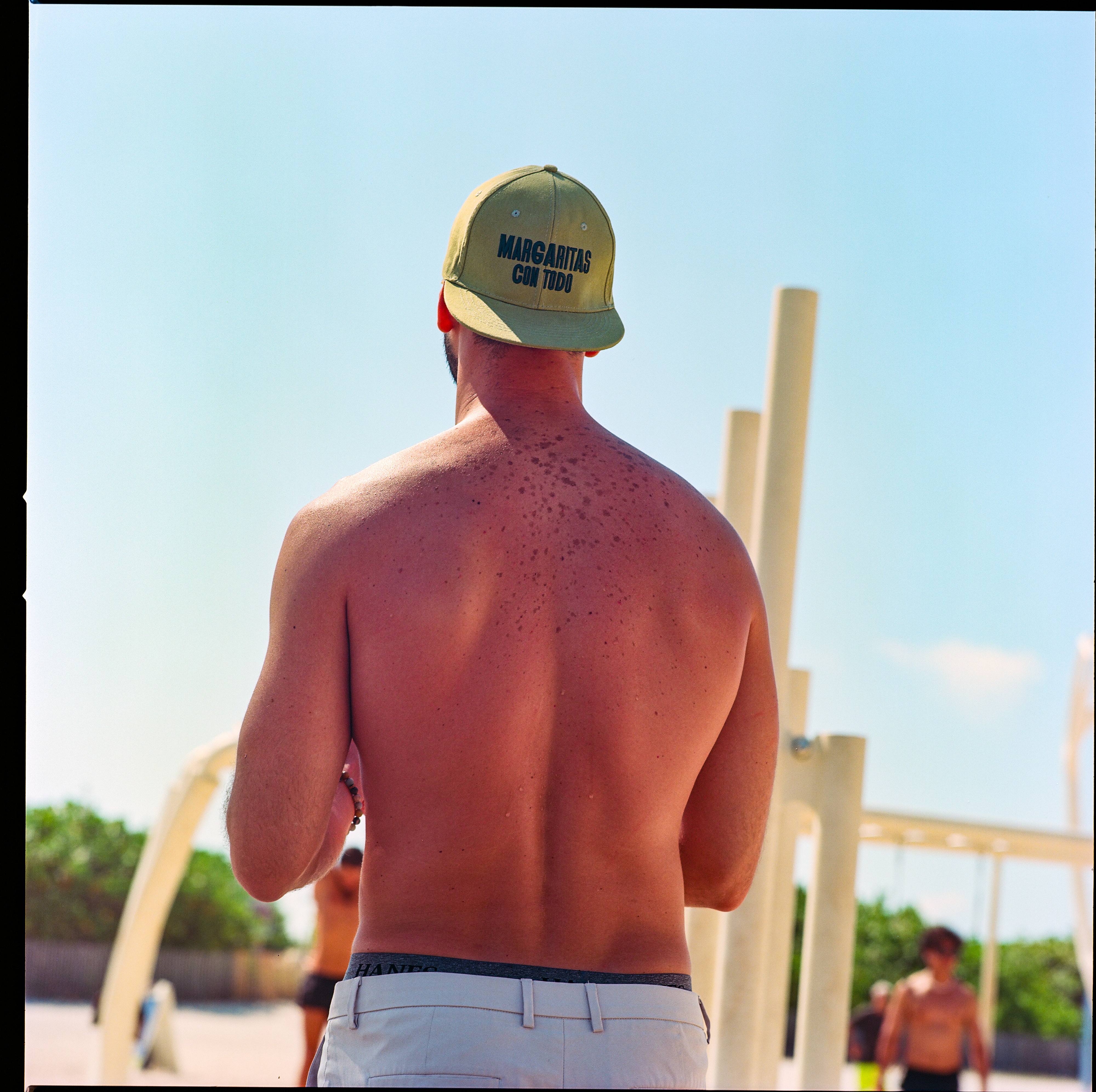Miami Beach 014, a square-format photograph street photograph made in Miami Beach, Florida by Robert Andy Coombs.