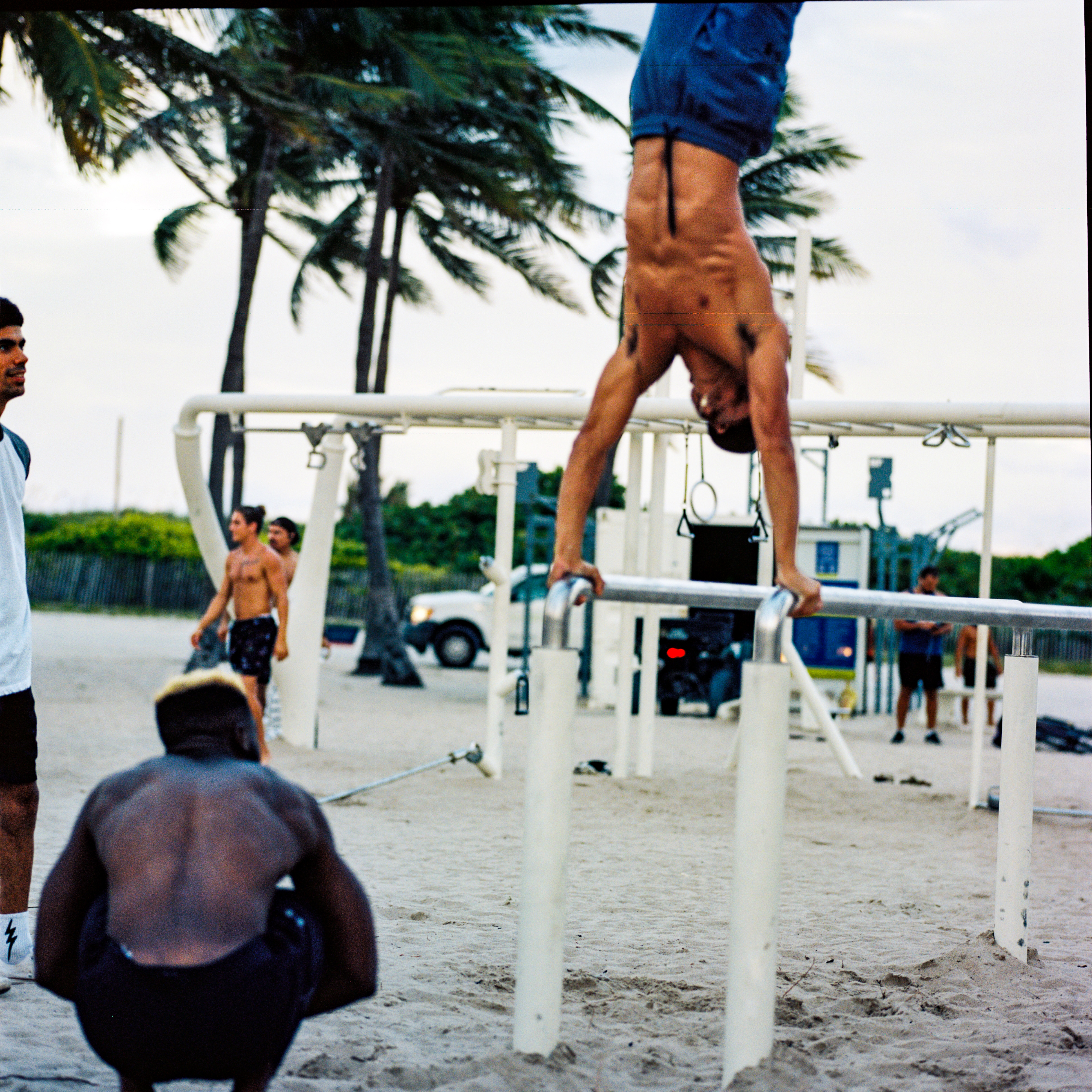 Miami Beach 031, a square-format photograph street photograph made in Miami Beach, Florida by Robert Andy Coombs.
