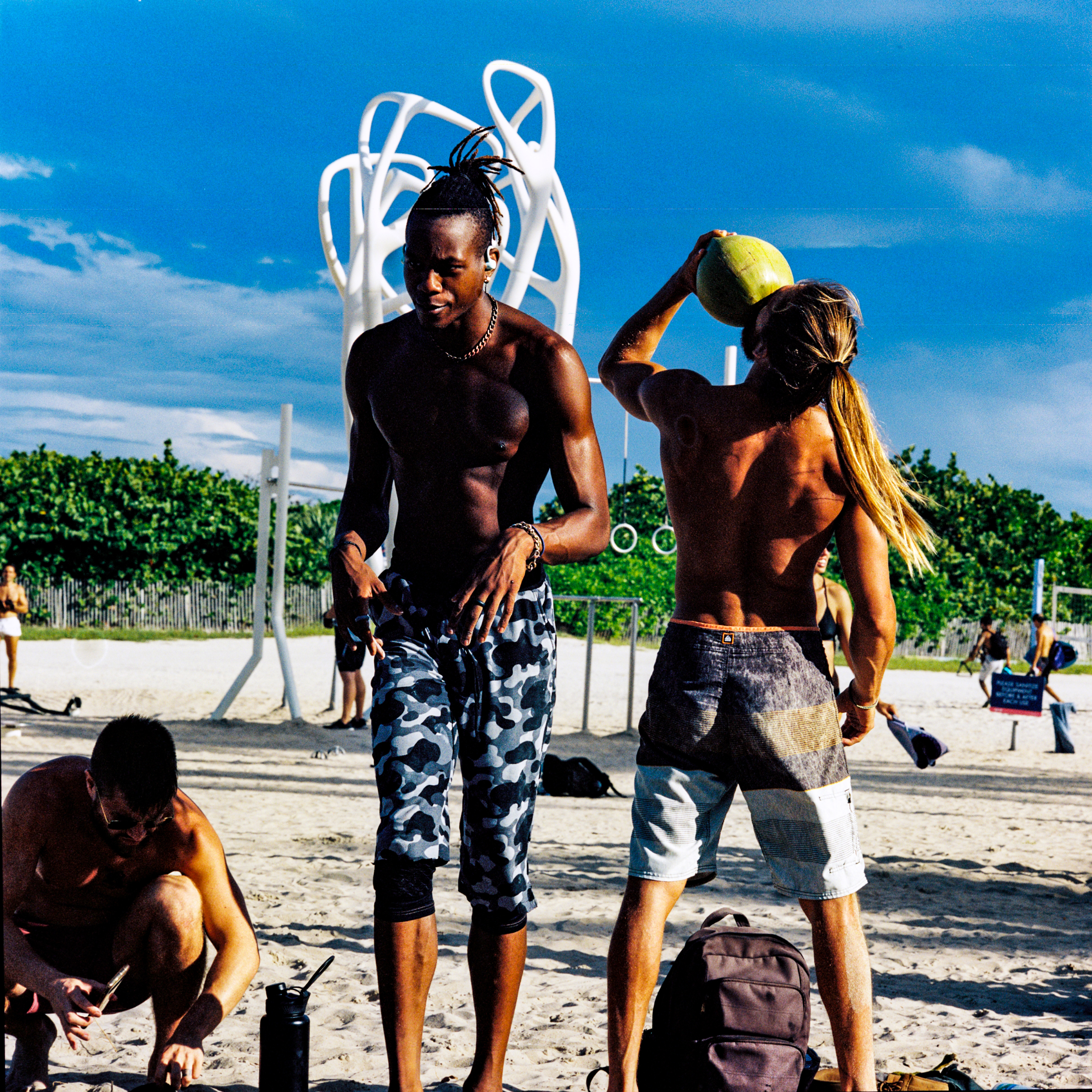 Miami Beach 036, a square-format photograph street photograph made in Miami Beach, Florida by Robert Andy Coombs.