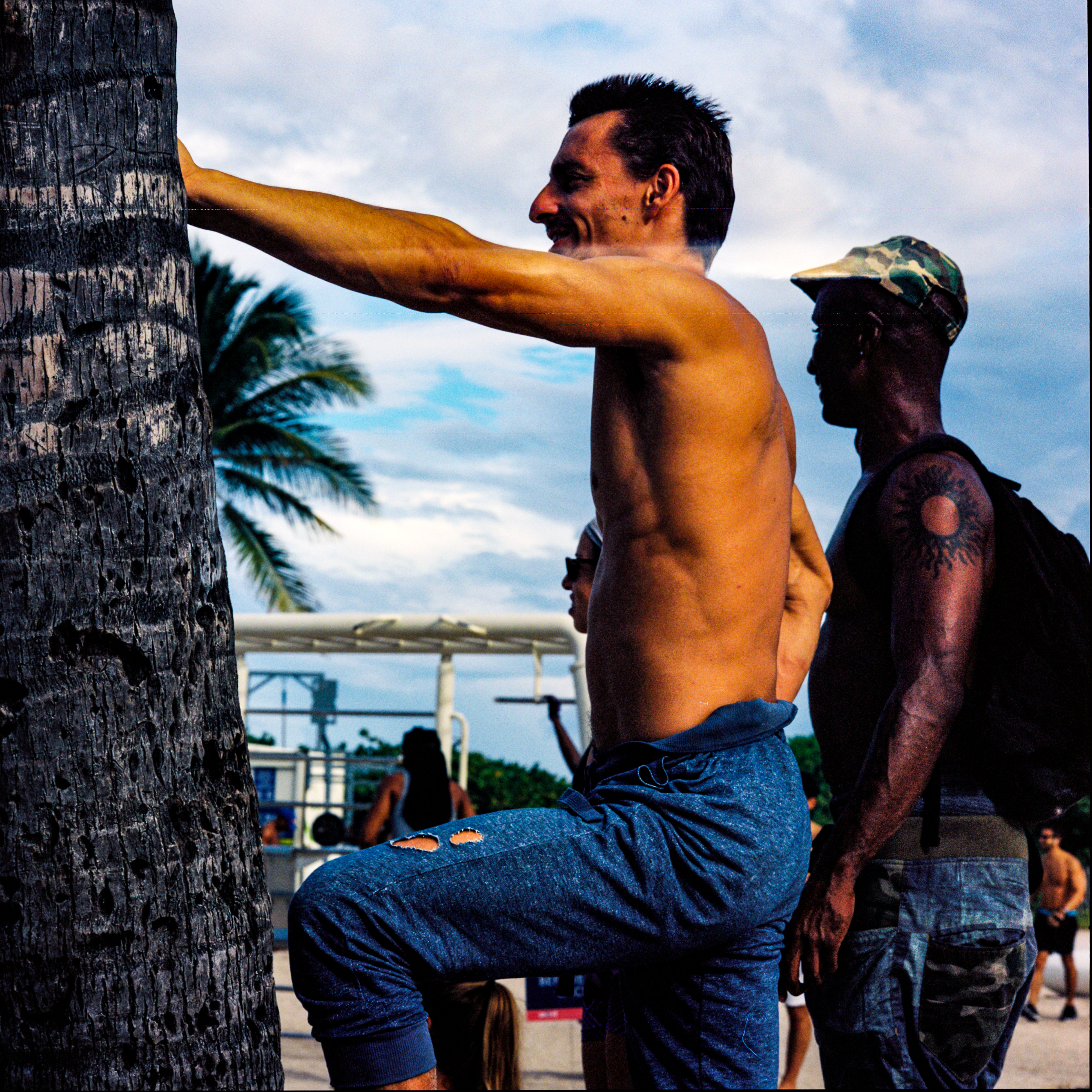 Miami Beach 038, a square-format photograph street photograph made in Miami Beach, Florida by Robert Andy Coombs.