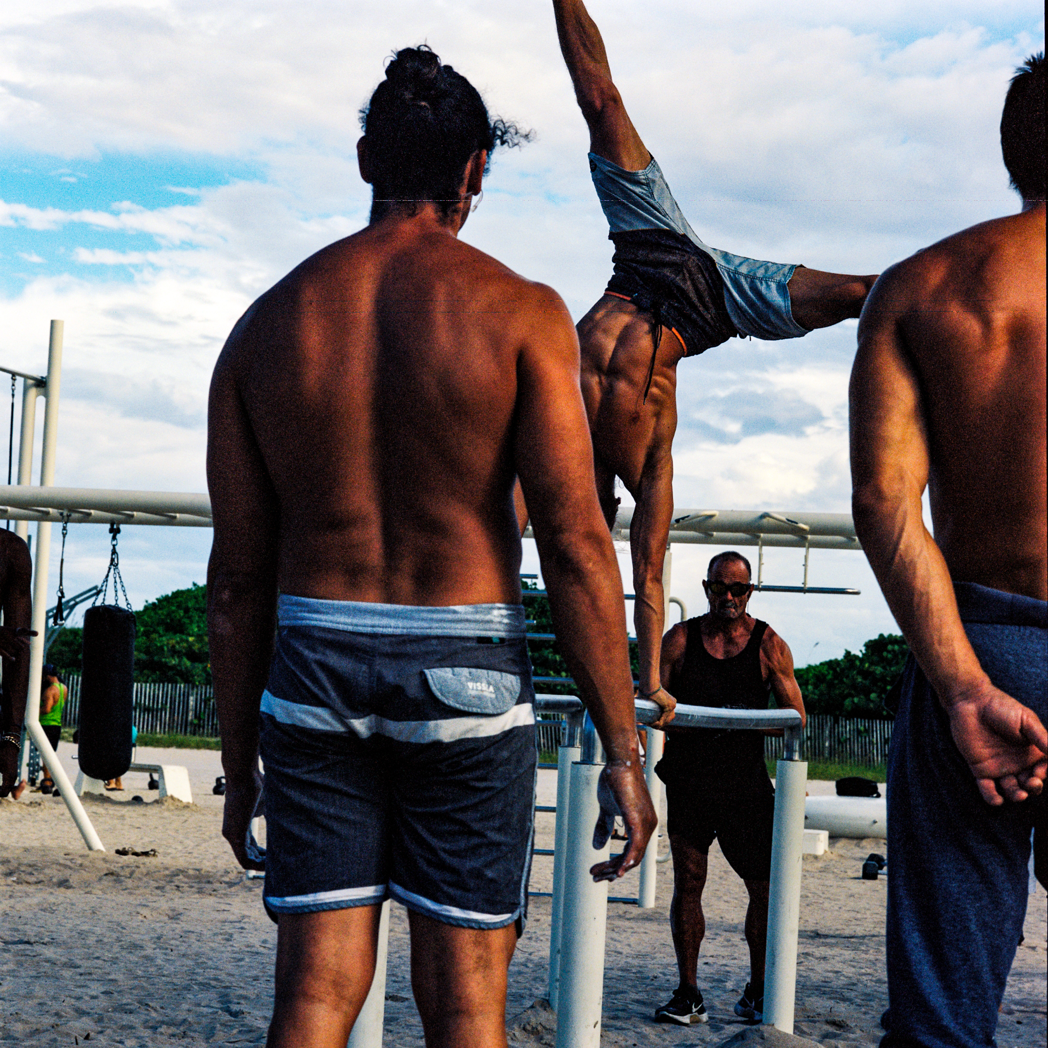 Miami Beach 042, a square-format photograph street photograph made in Miami Beach, Florida by Robert Andy Coombs.