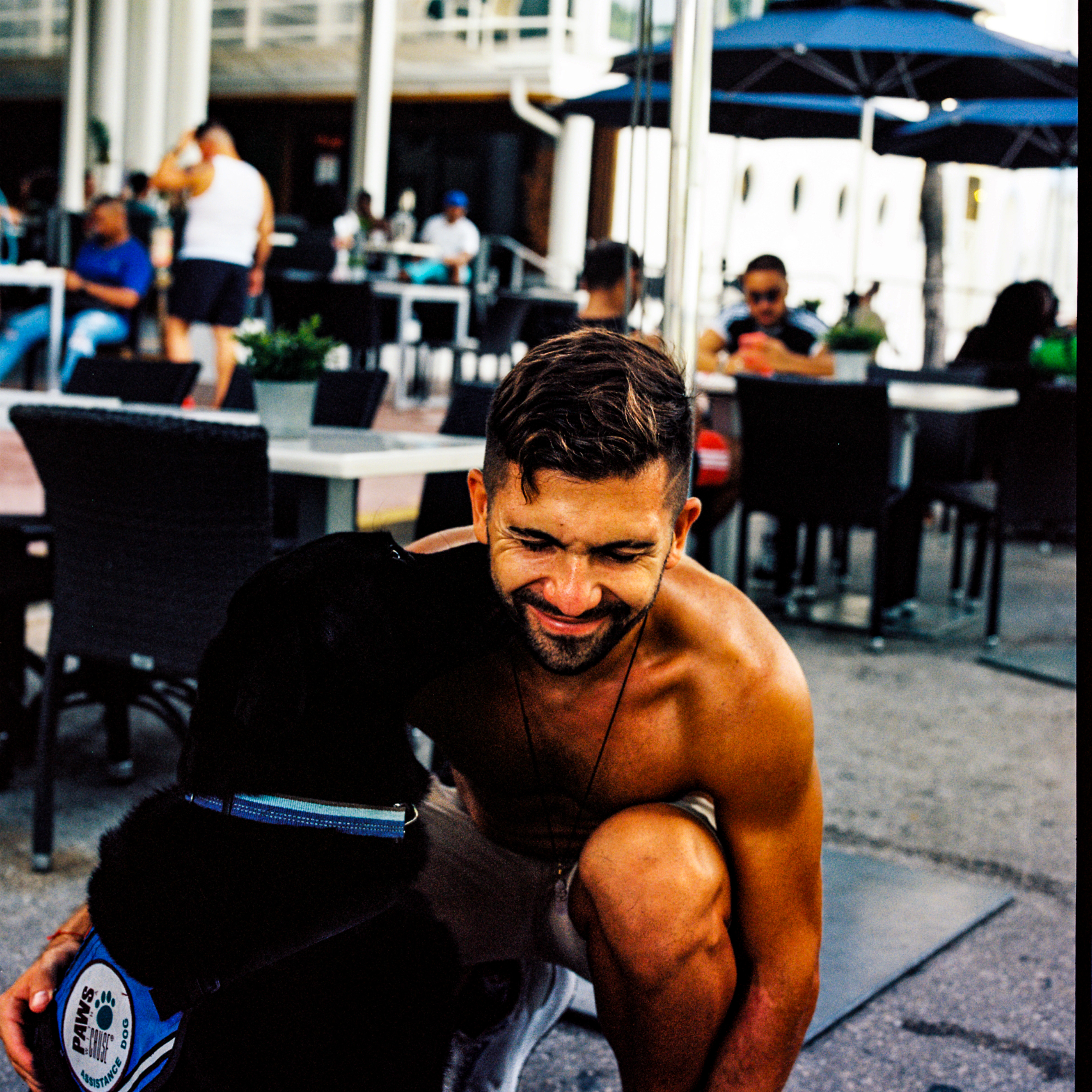 Miami Beach 052, a square-format photograph street photograph made in Miami Beach, Florida by Robert Andy Coombs.