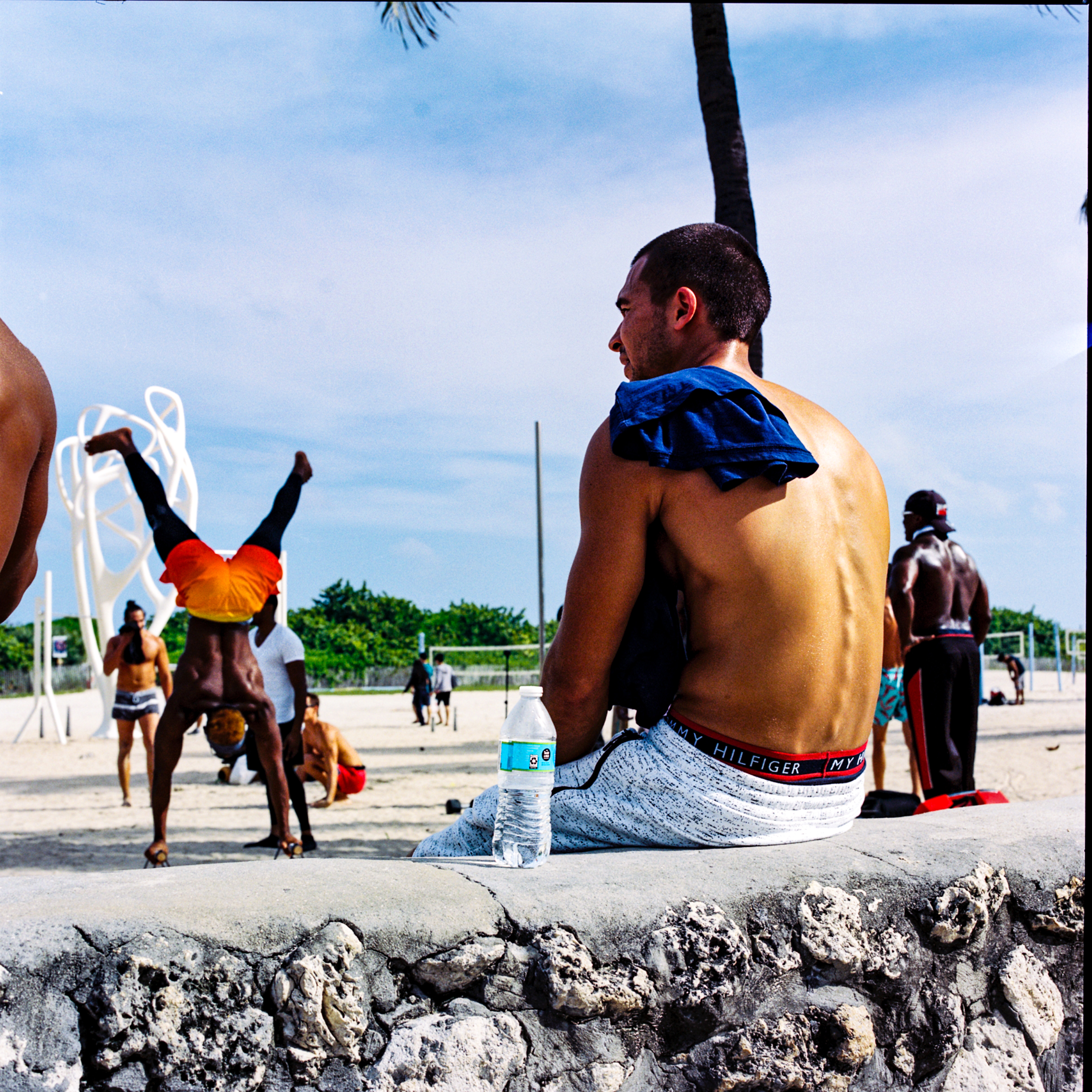Miami Beach 053, a square-format photograph street photograph made in Miami Beach, Florida by Robert Andy Coombs.