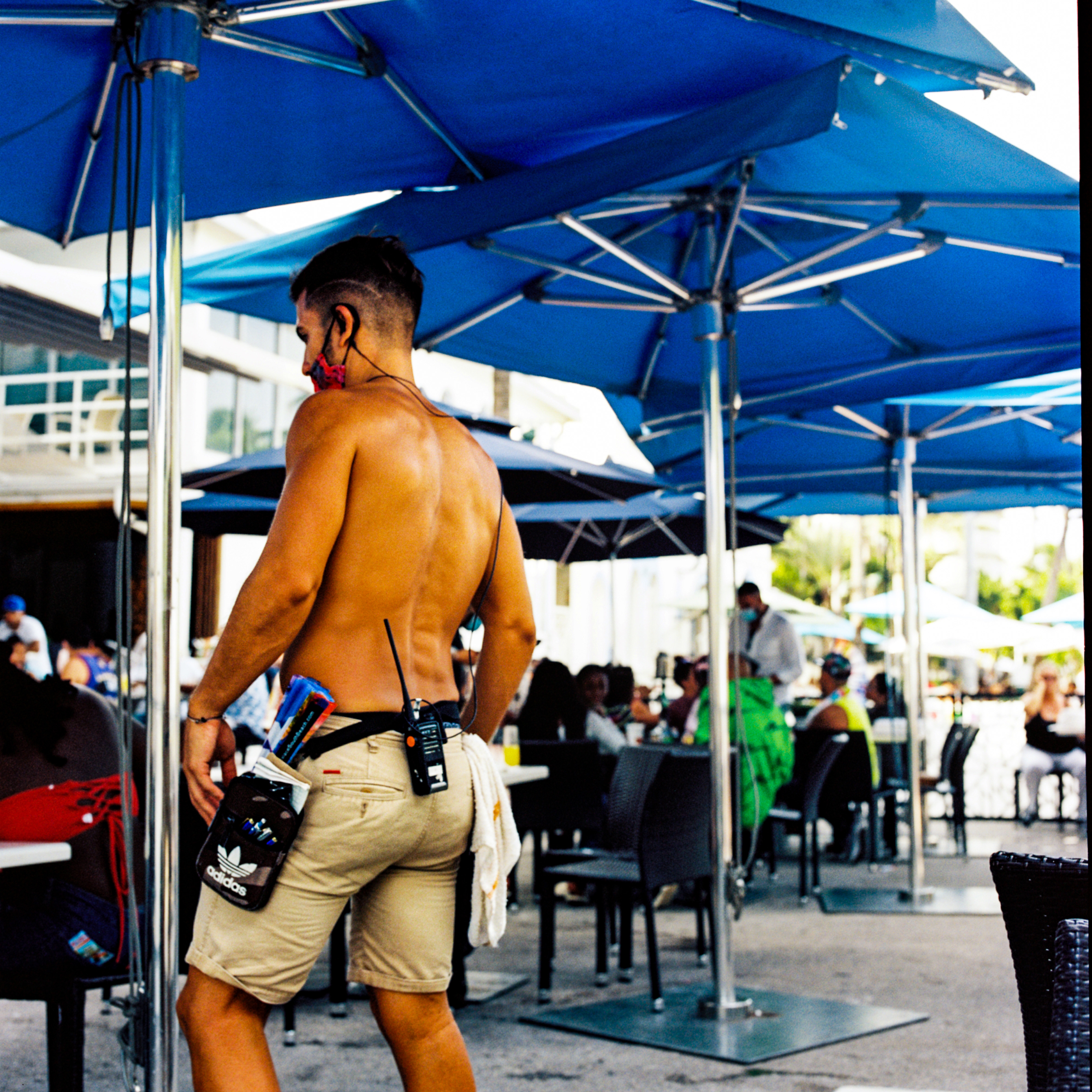 Miami Beach 054, a square-format photograph street photograph made in Miami Beach, Florida by Robert Andy Coombs.