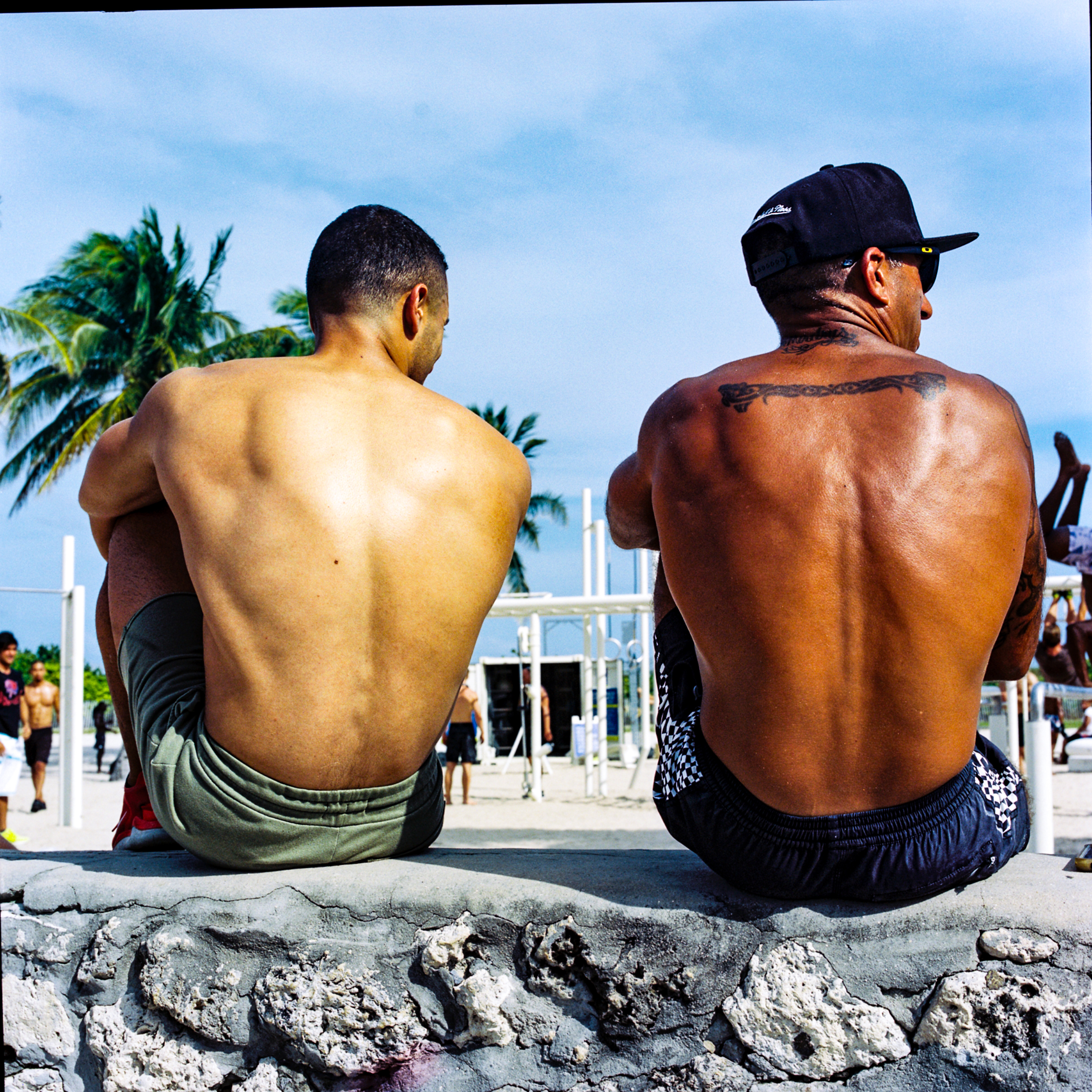 Miami Beach 056, a square-format photograph street photograph made in Miami Beach, Florida by Robert Andy Coombs.