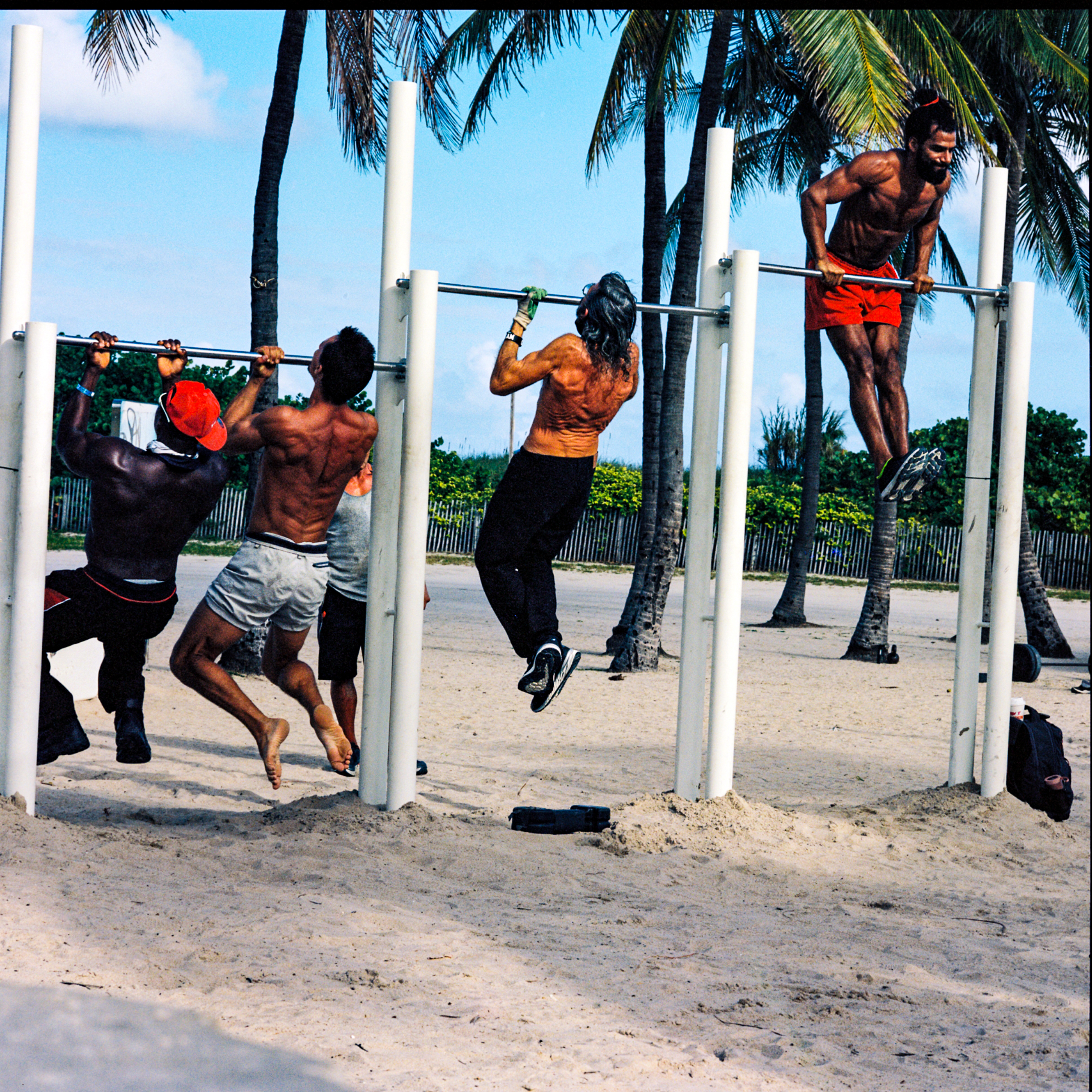 Miami Beach 074, a square-format photograph street photograph made in Miami Beach, Florida by Robert Andy Coombs.