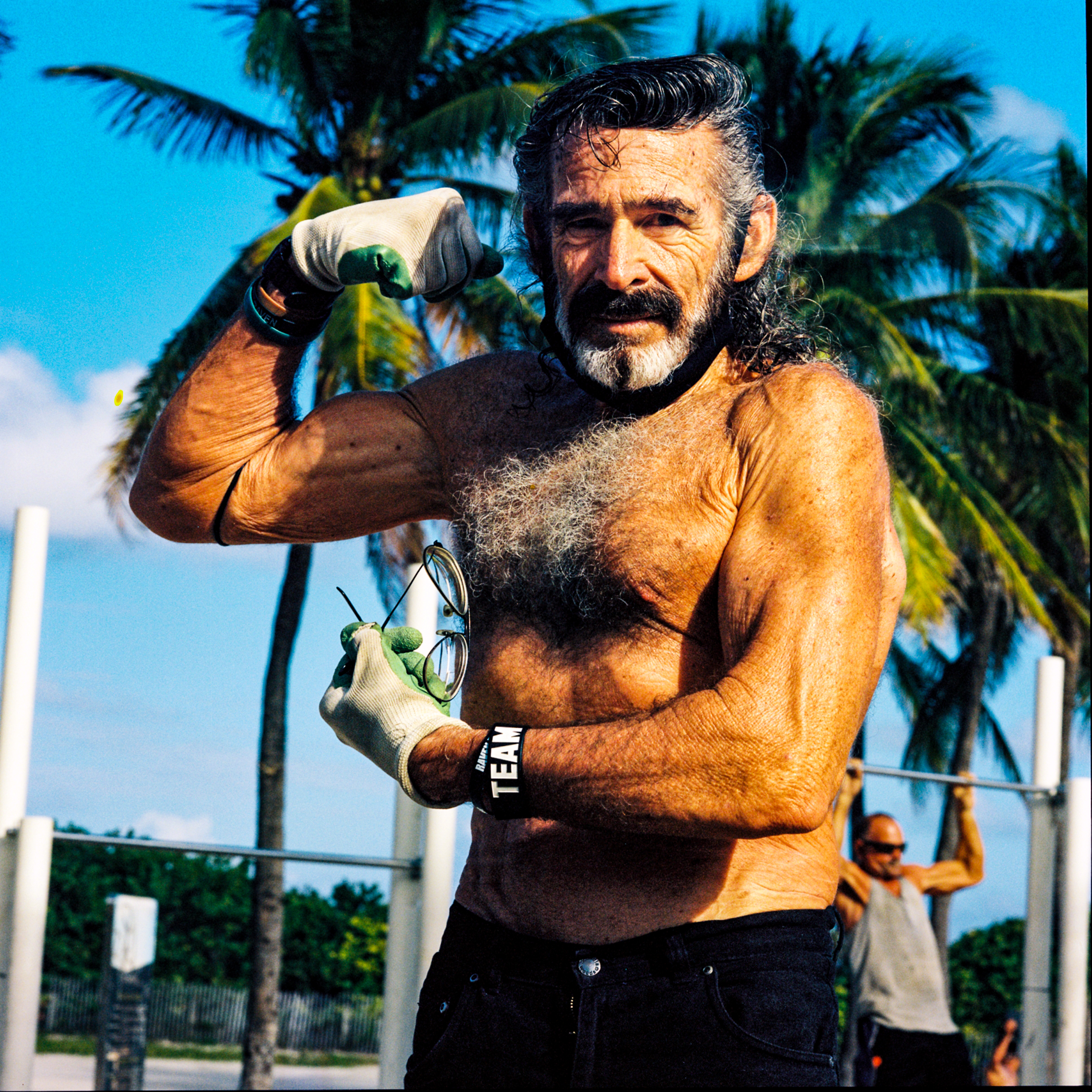 Miami Beach 075, a square-format photograph street photograph made in Miami Beach, Florida by Robert Andy Coombs.