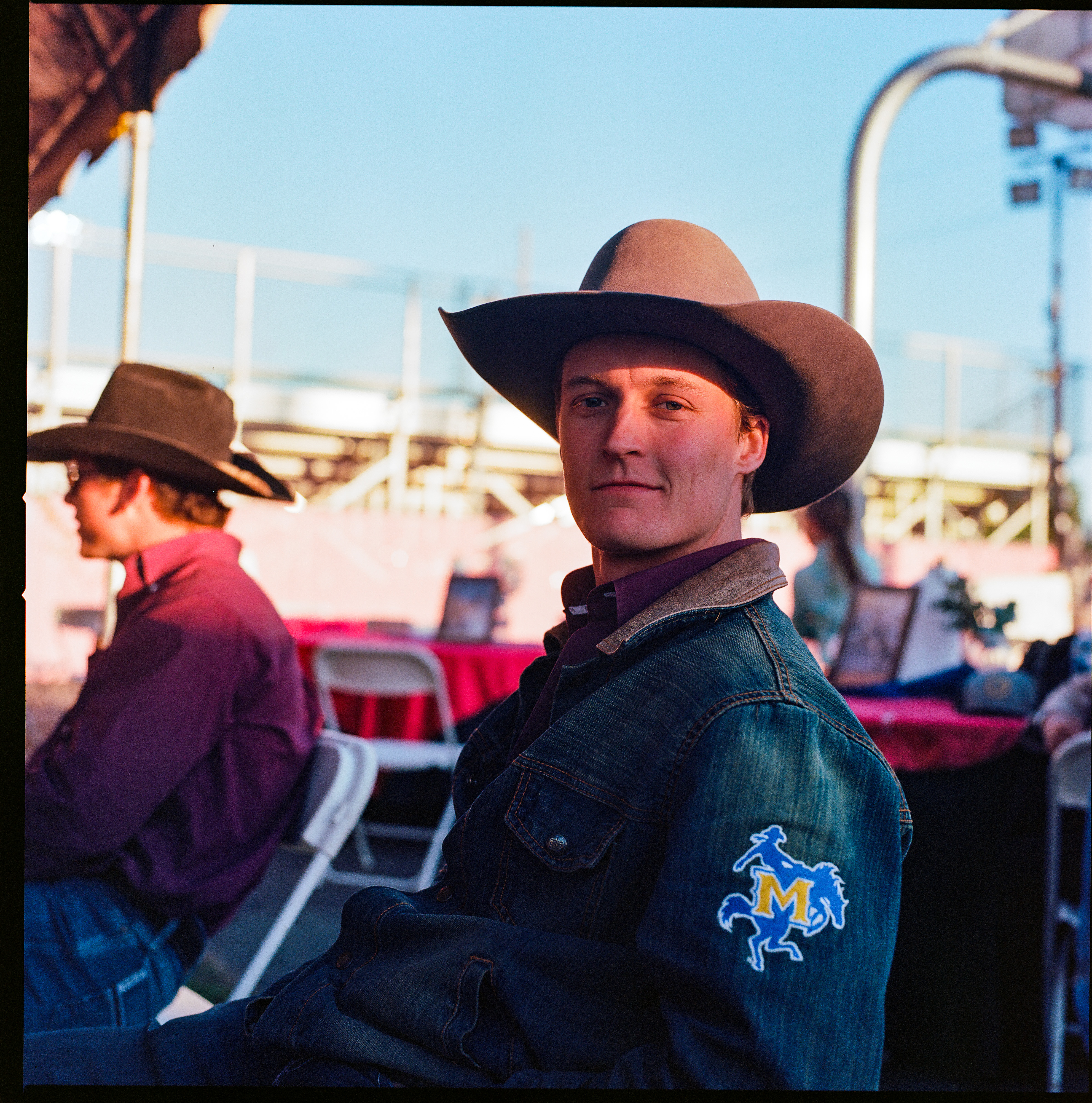 Rodeo 002, a square-format photograph street photograph by Robert Andy Coombs.