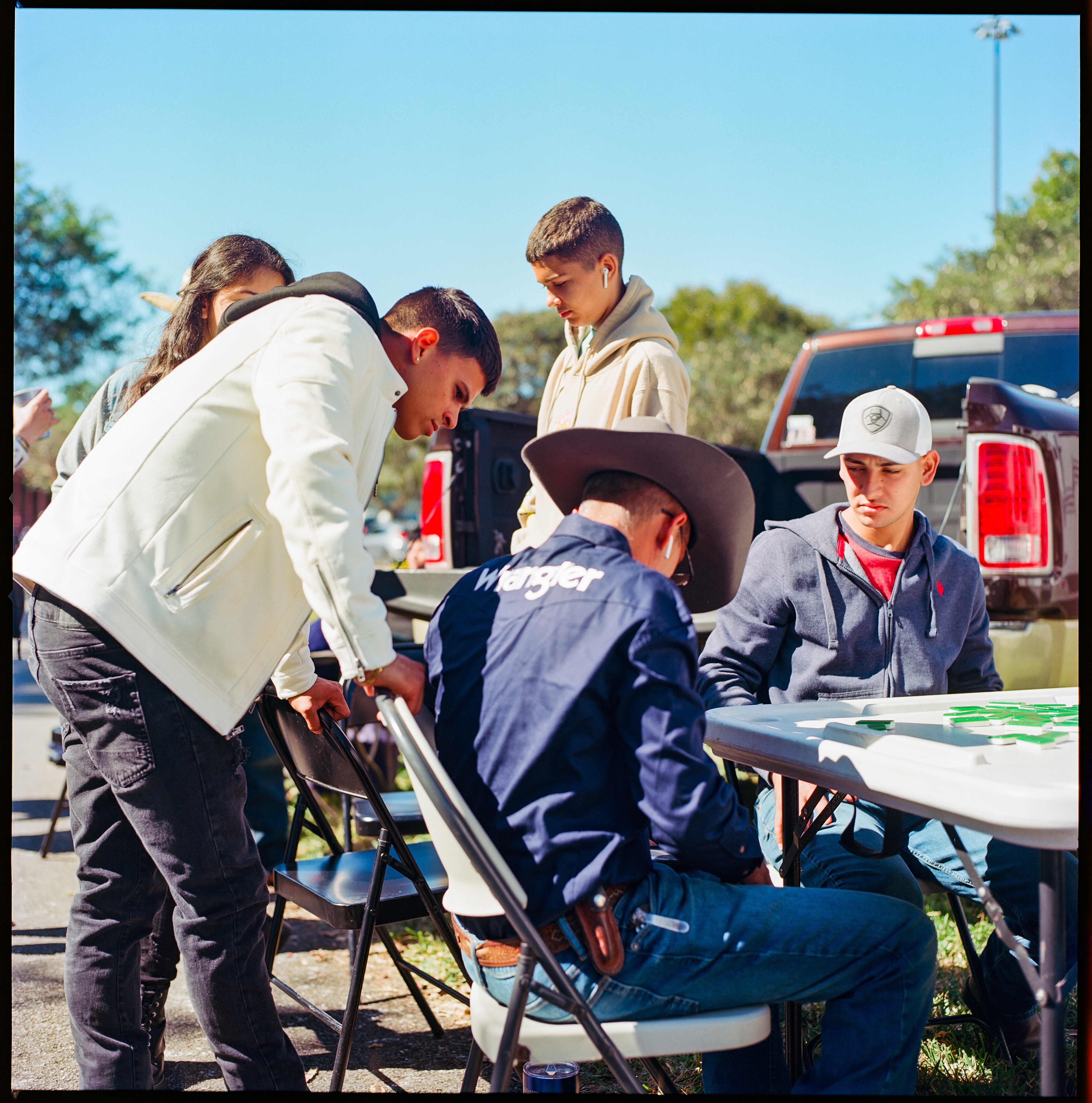 Rodeo 018, a square-format photograph street photograph by Robert Andy Coombs.