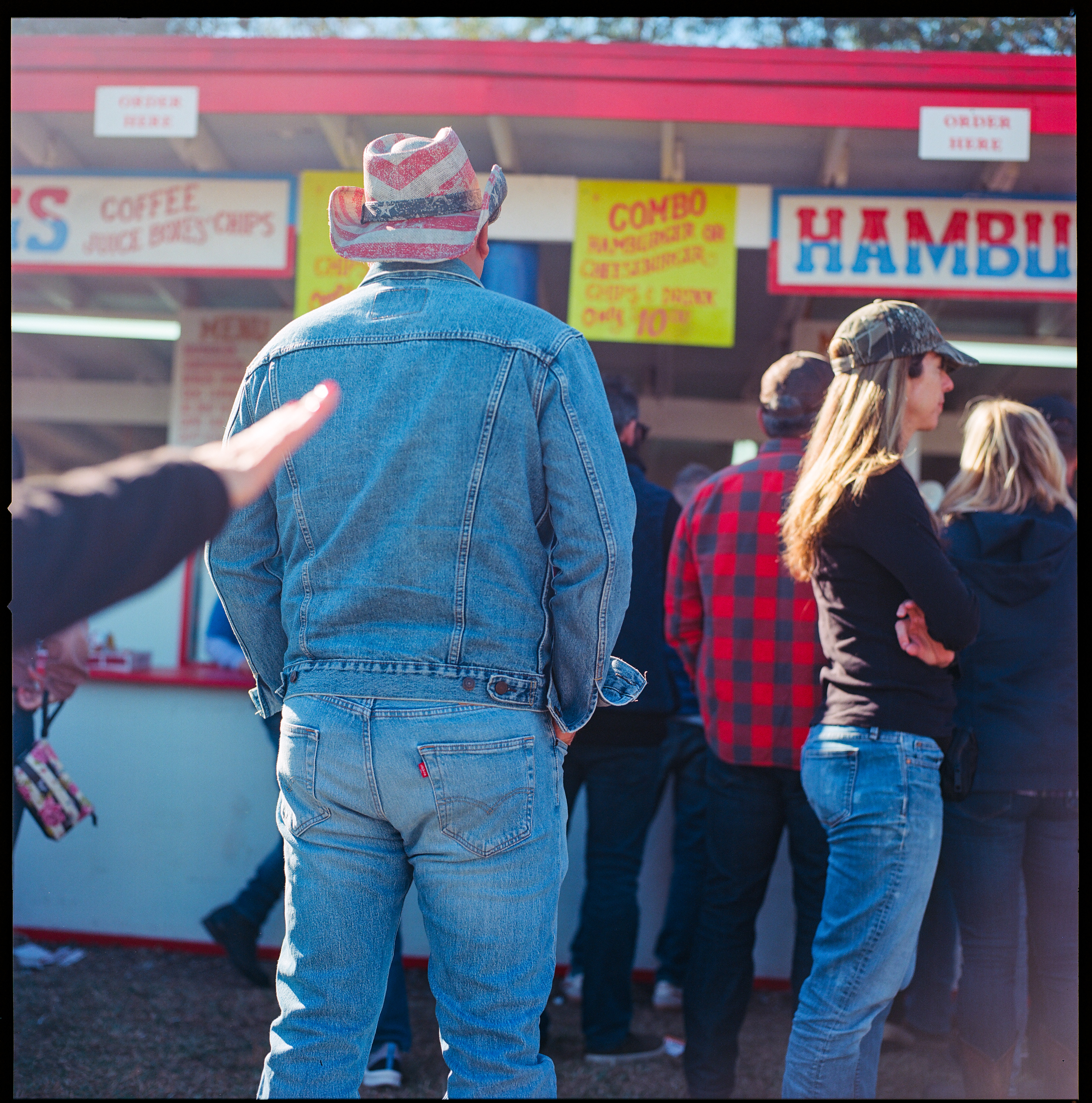 Rodeo 022, a square-format photograph street photograph by Robert Andy Coombs.