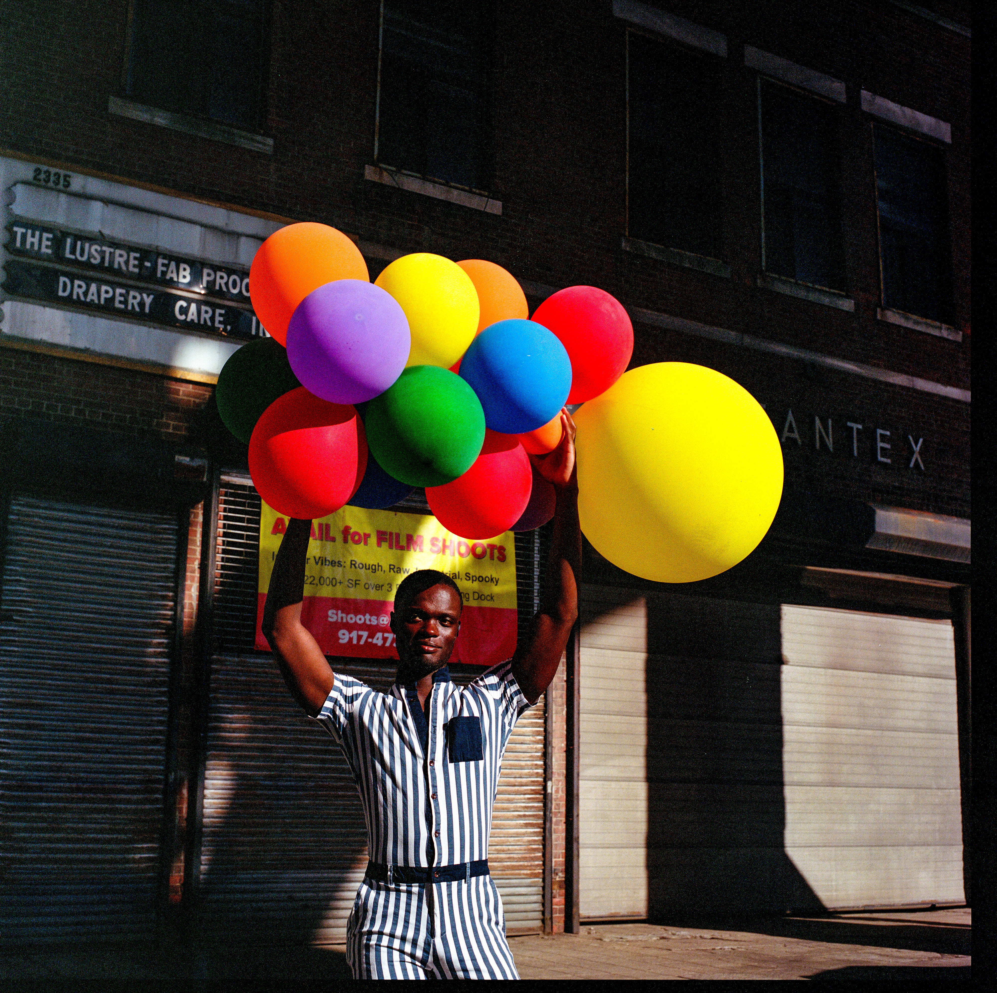 Traversing Pride 007, a square-format photograph street photograph by Robert Andy Coombs.