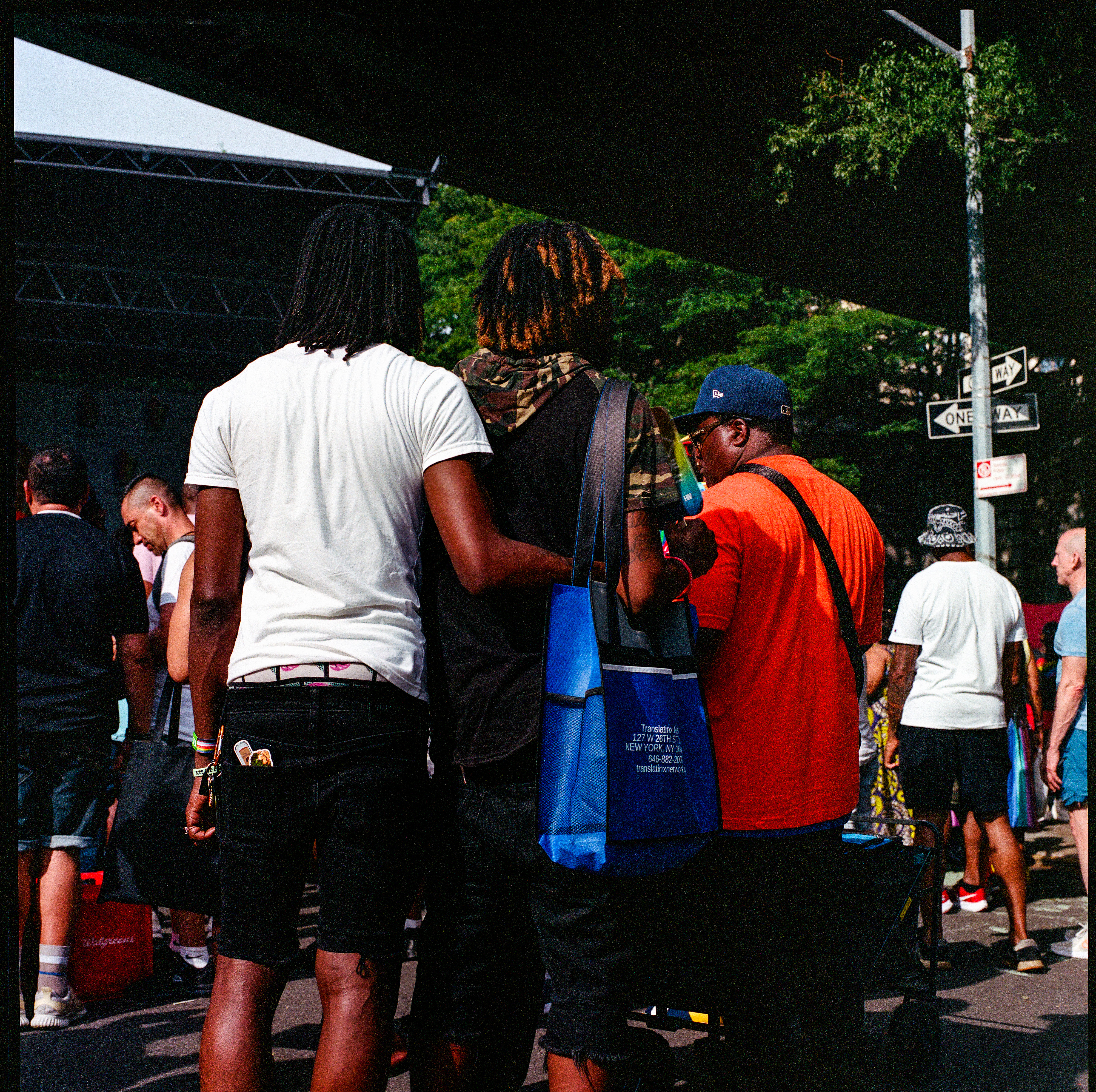 Traversing Pride 008, a square-format photograph street photograph by Robert Andy Coombs.