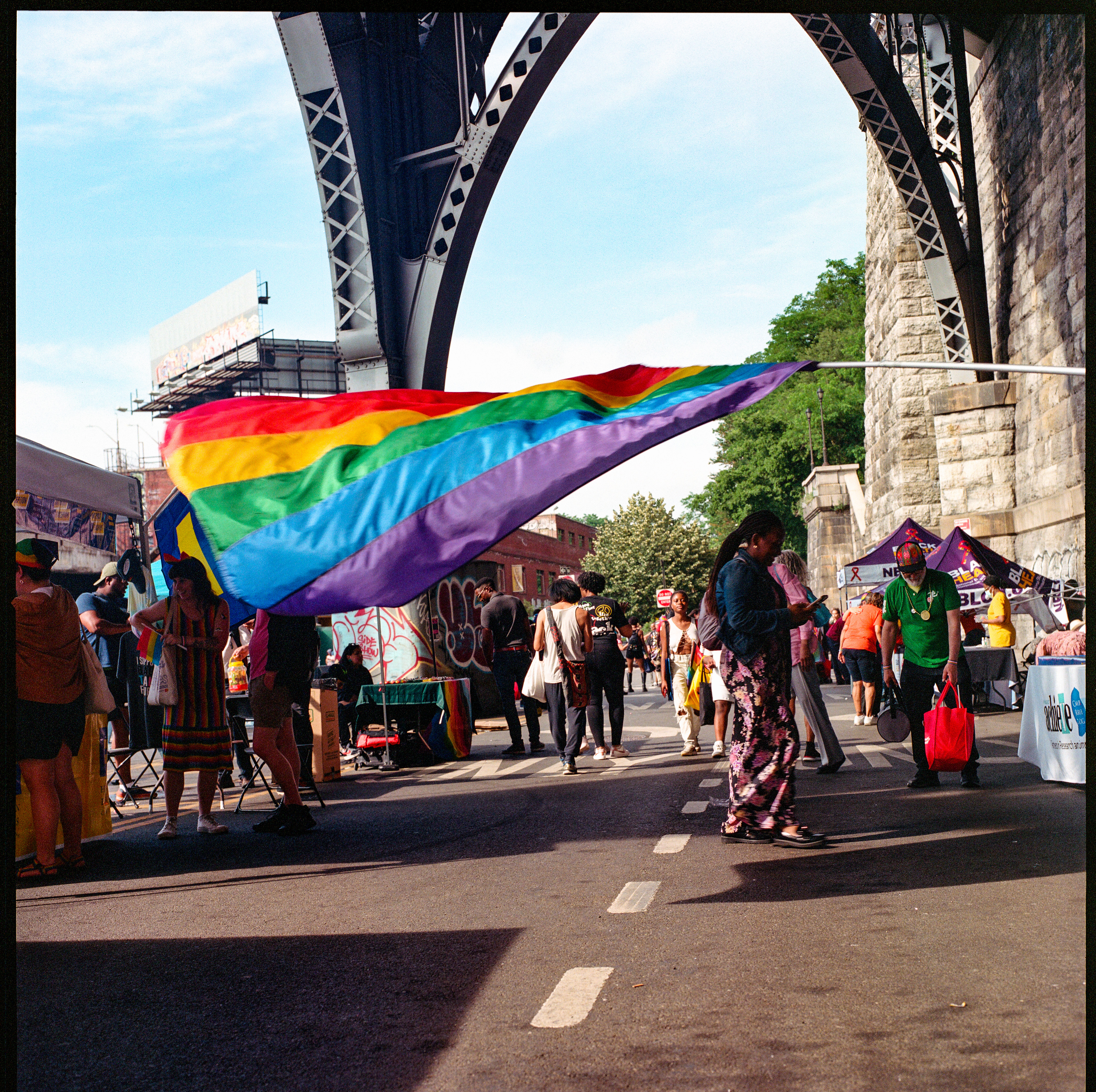 Traversing Pride 009, a square-format photograph street photograph by Robert Andy Coombs.