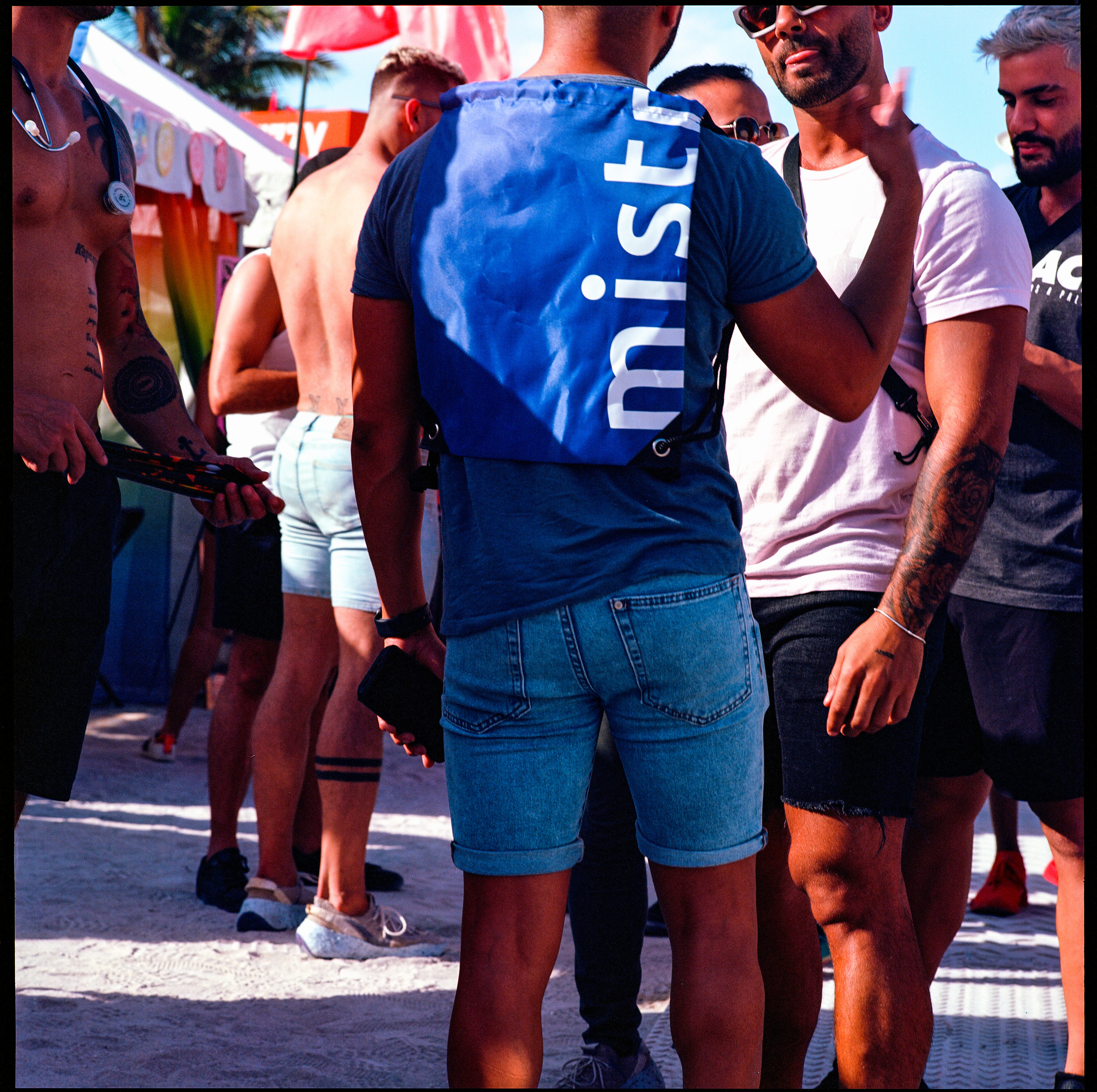 Traversing Pride 061, a square-format photograph street photograph by Robert Andy Coombs.