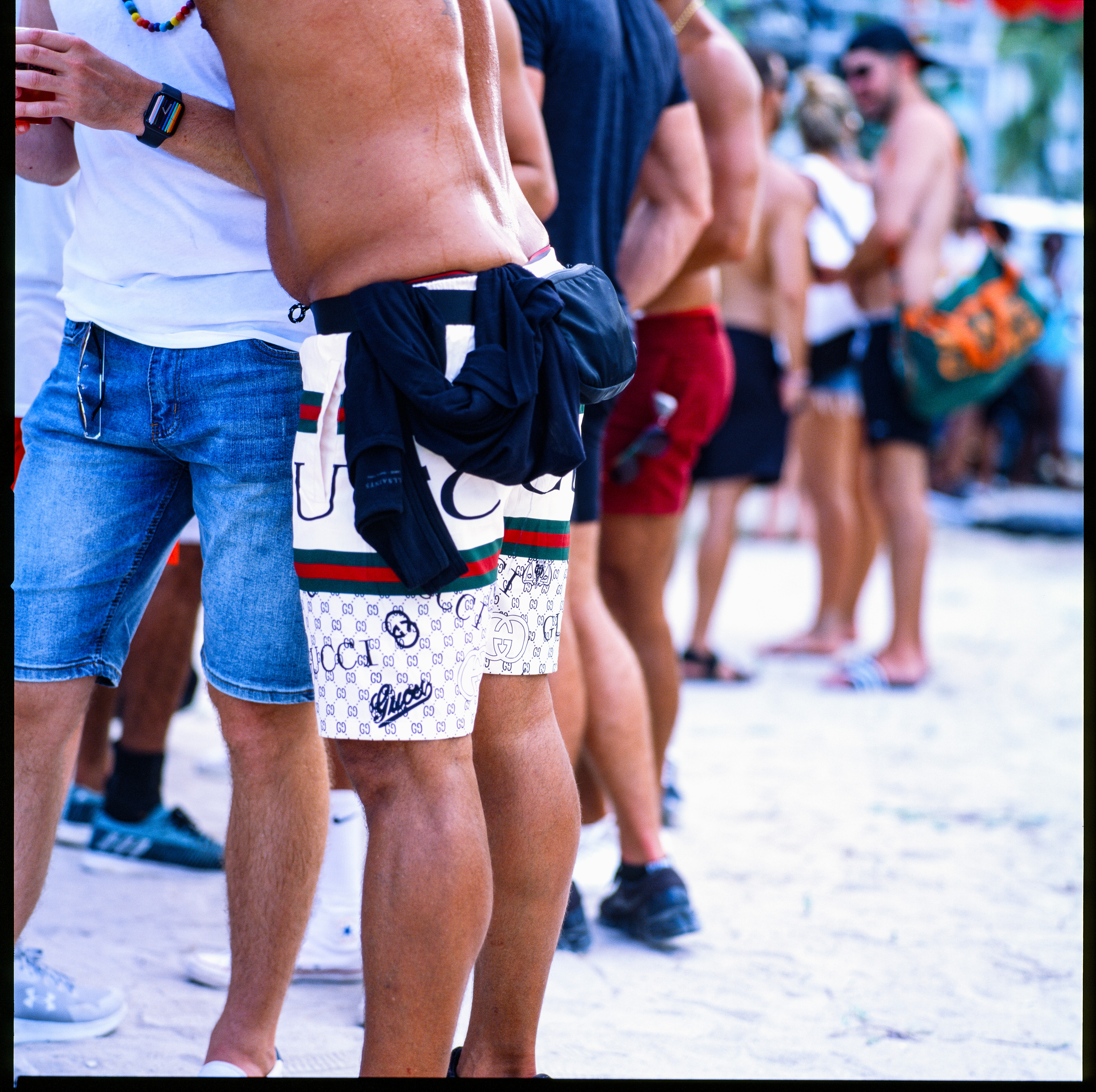 Traversing Pride 077, a square-format photograph street photograph by Robert Andy Coombs.