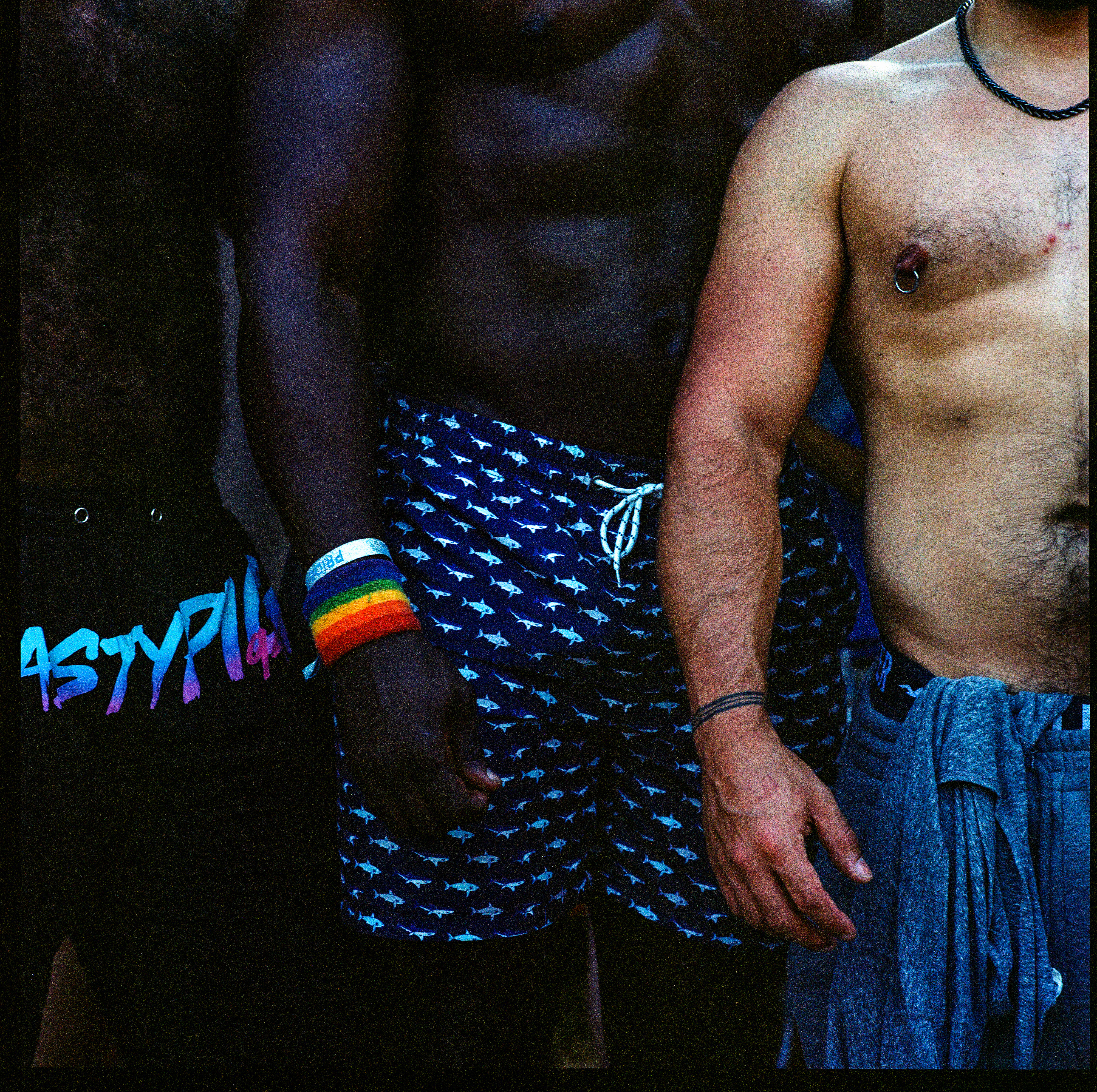 Traversing Pride 105, a square-format photograph street photograph by Robert Andy Coombs.