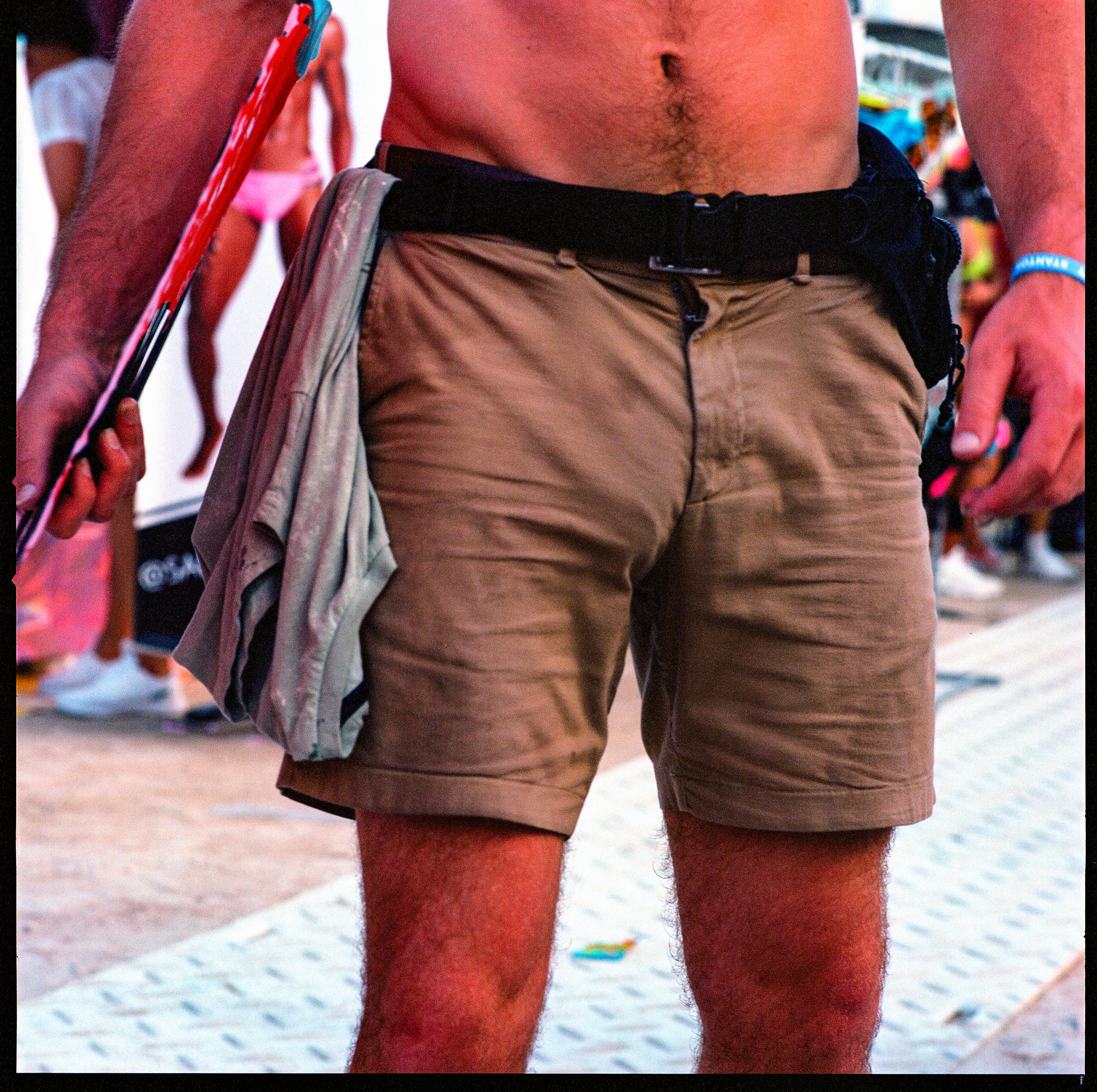 Traversing Pride 107, a square-format photograph street photograph by Robert Andy Coombs.