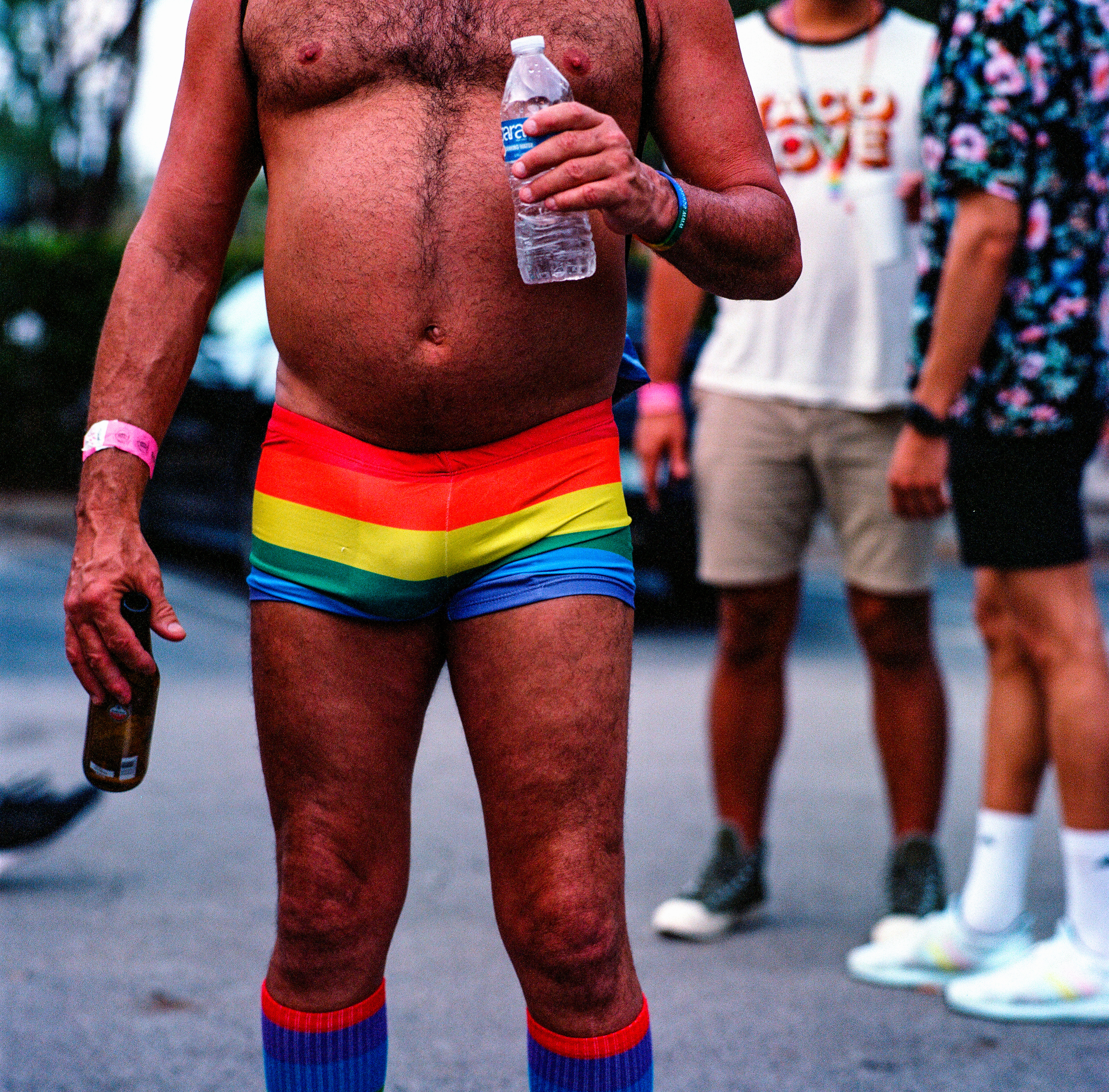 Traversing Pride 111, a square-format photograph street photograph by Robert Andy Coombs.