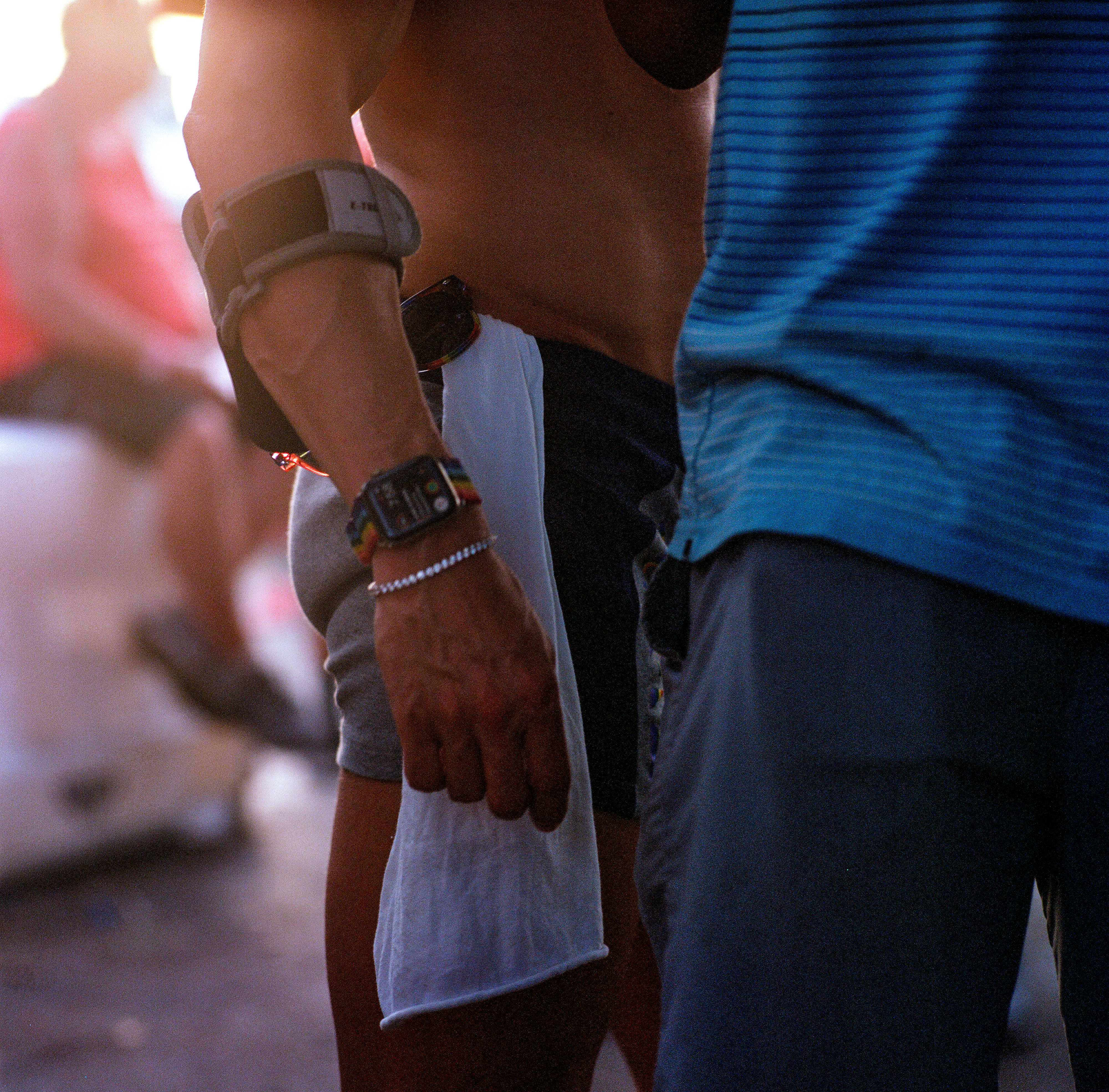 Traversing Pride 112, a square-format photograph street photograph by Robert Andy Coombs.