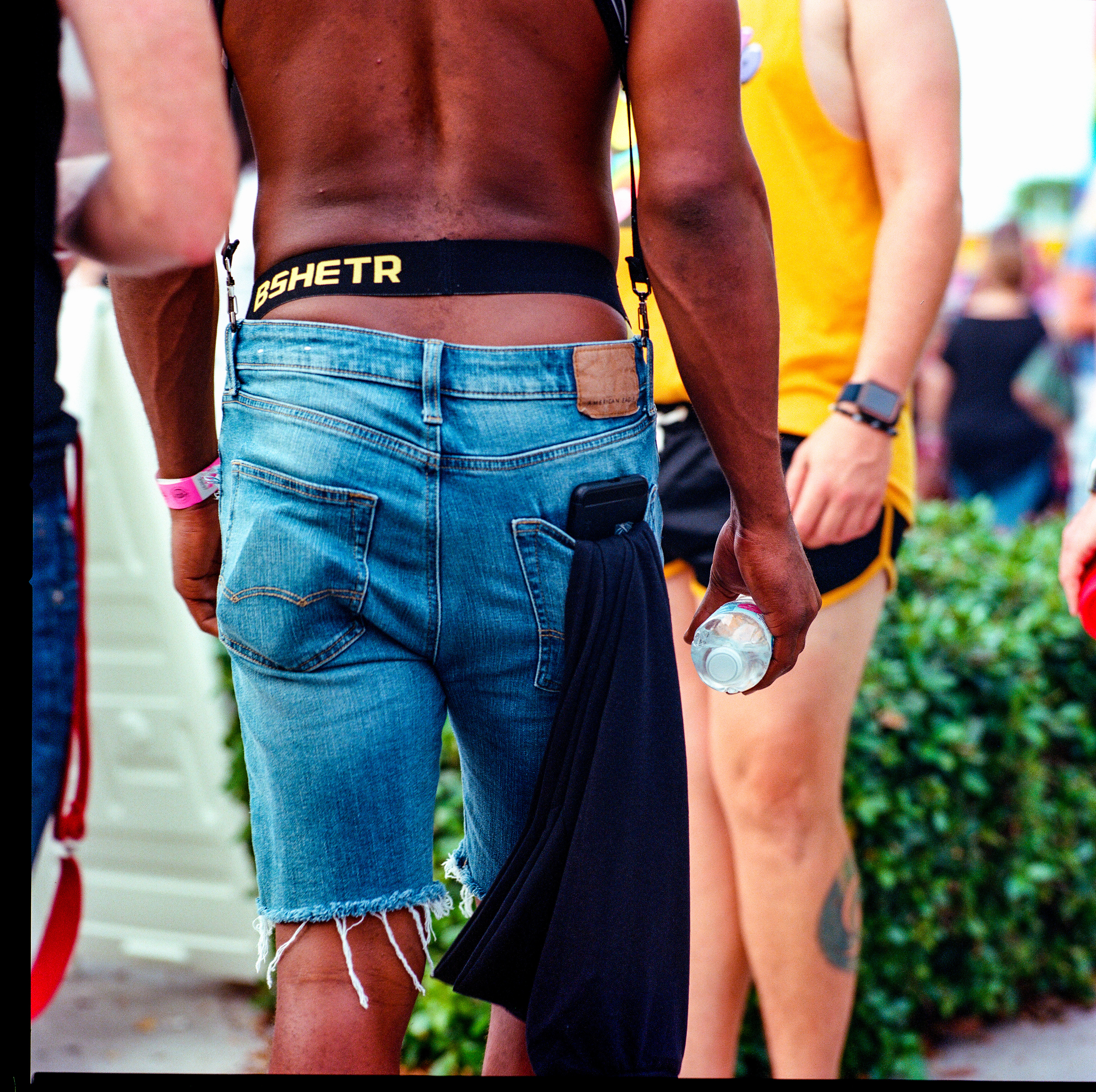 Traversing Pride 117, a square-format photograph street photograph by Robert Andy Coombs.