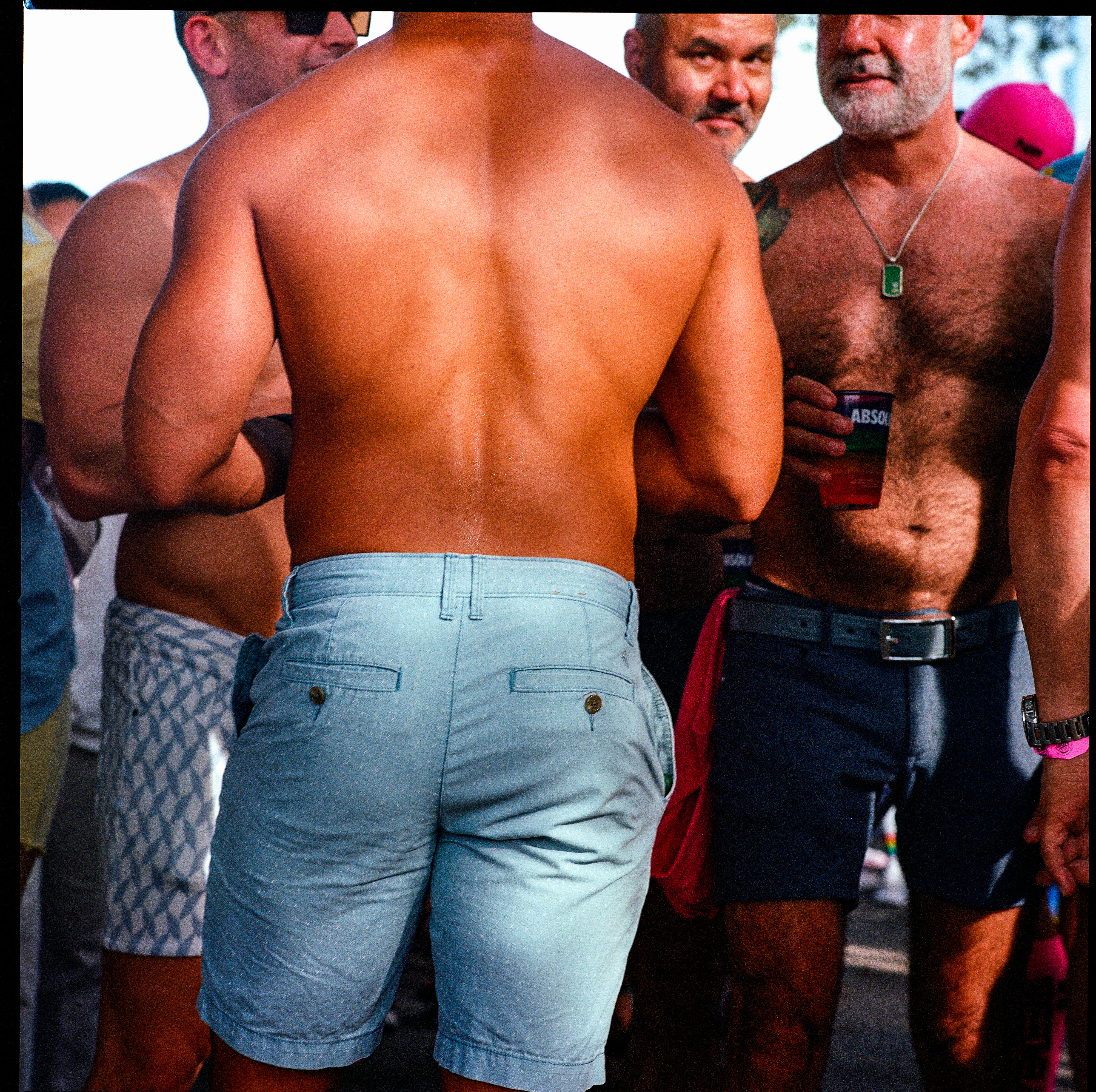 Traversing Pride 124, a square-format photograph street photograph by Robert Andy Coombs.