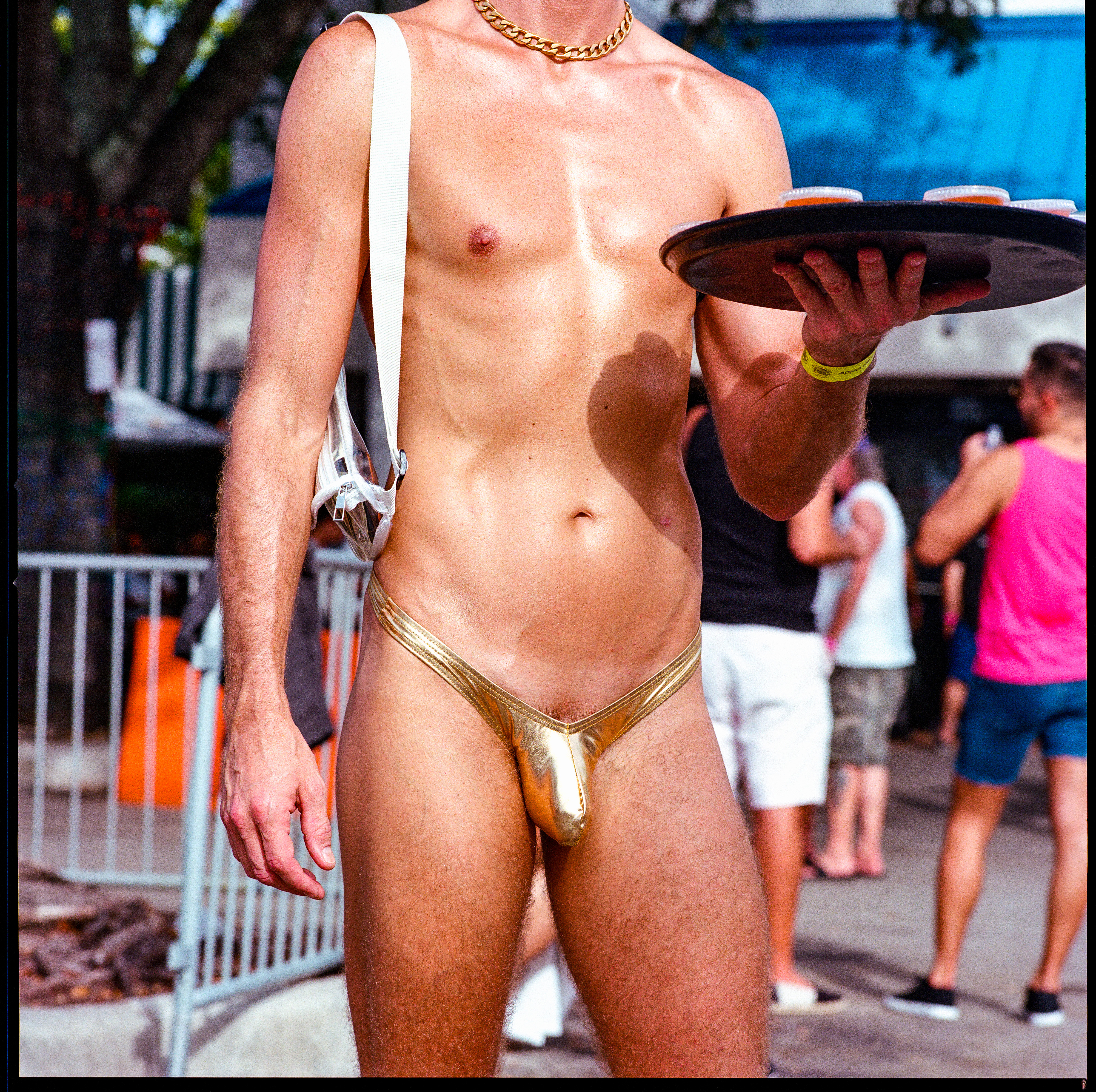 Traversing Pride 128, a square-format photograph street photograph by Robert Andy Coombs.